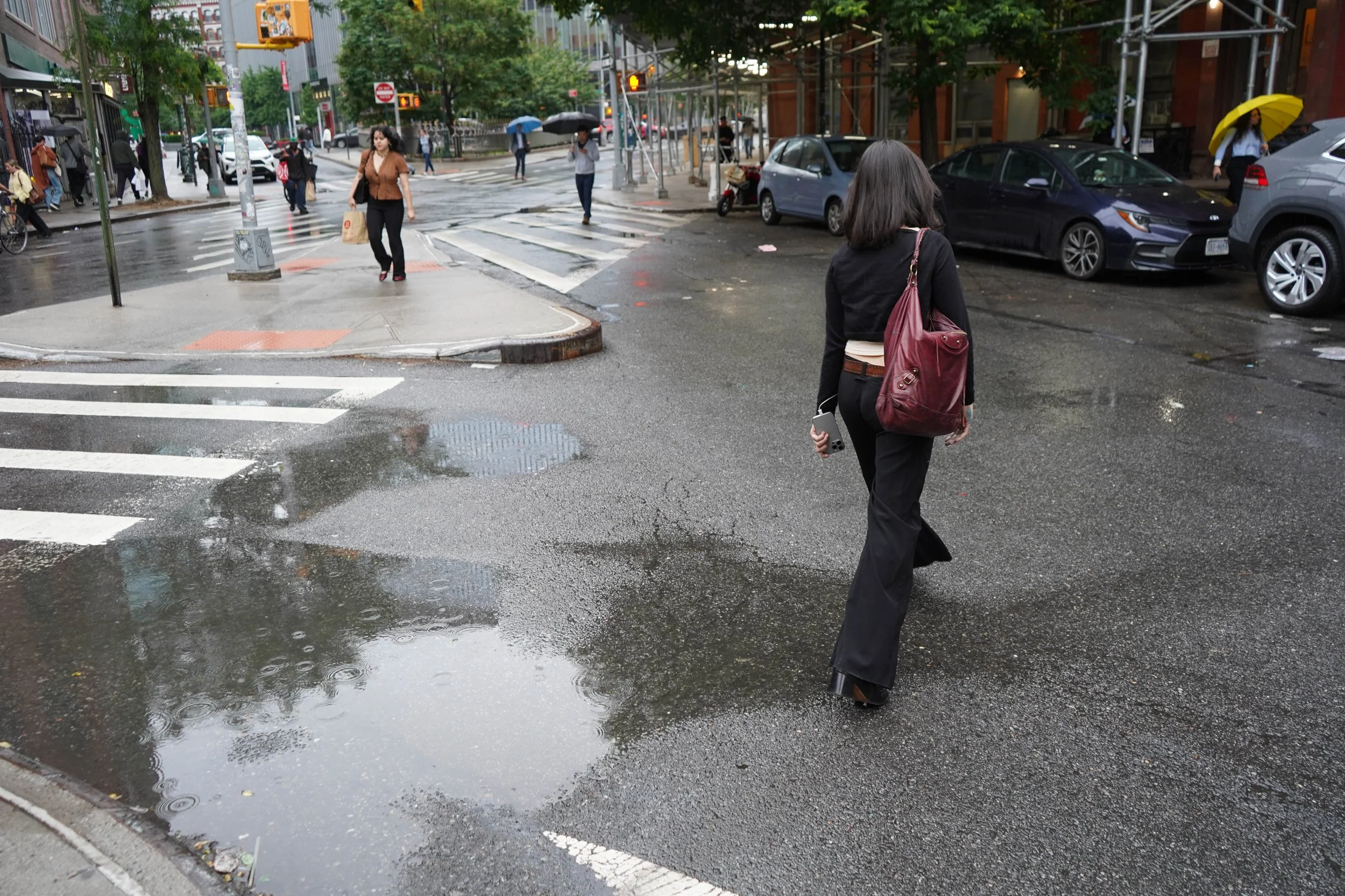 Chloe walks back to her apartment.