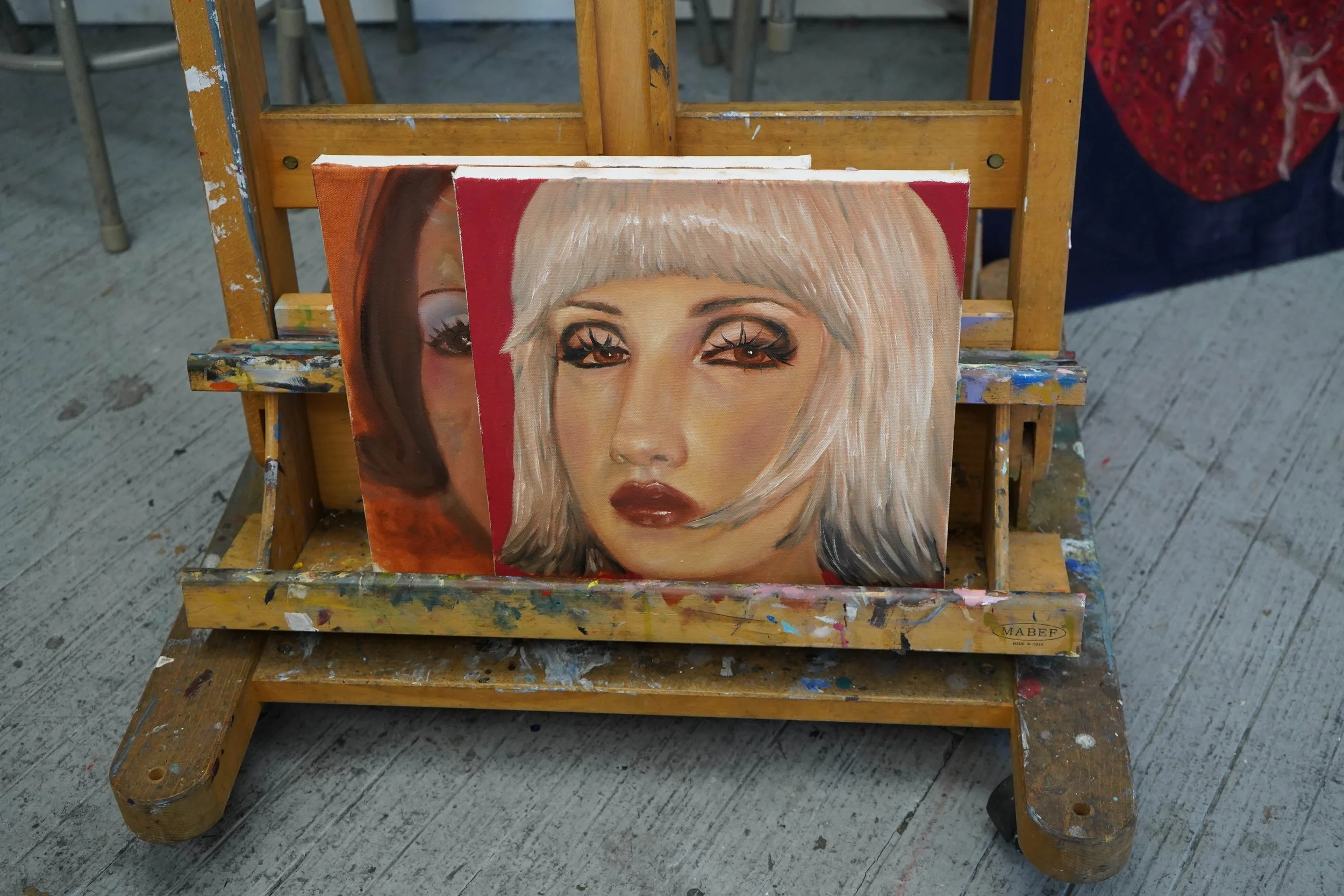 Many of the faces Chloe paints mimic her own, with differences in character.