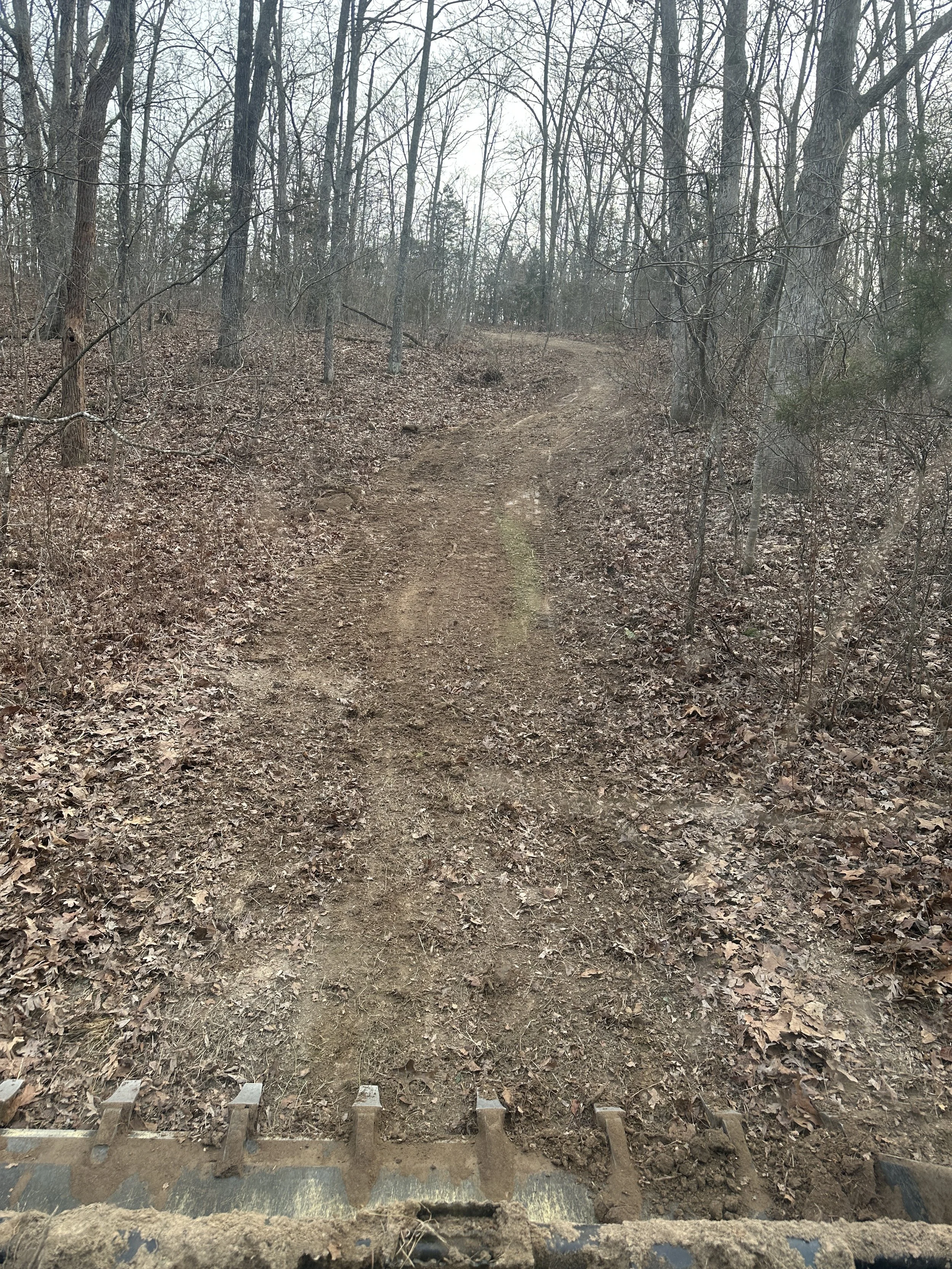 Before photo of existing trail on forestry mulching project in Sullivan MO