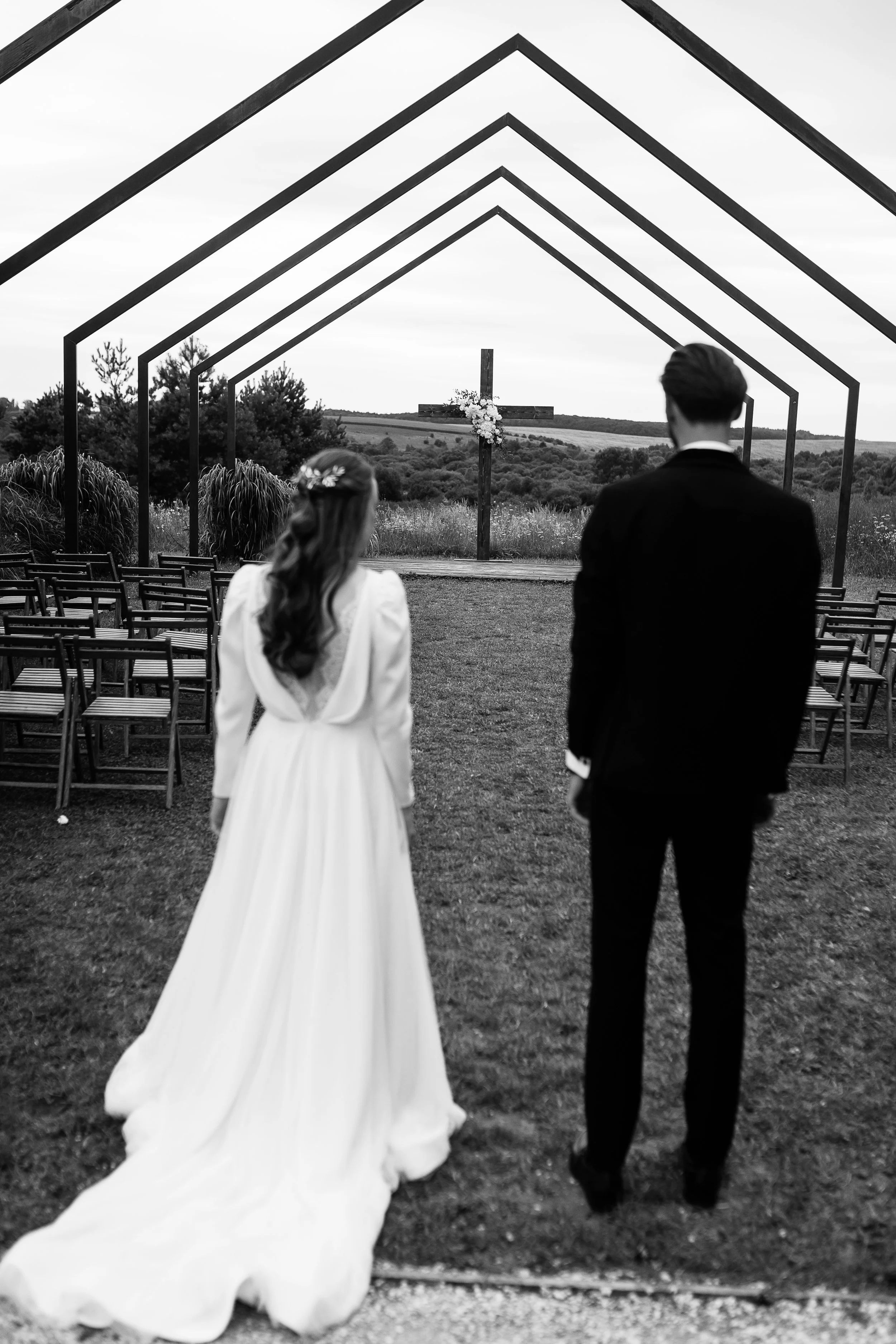 Bride_And_Groom_At_A_Chapel_With_A_Cross_original_1832115.jpg