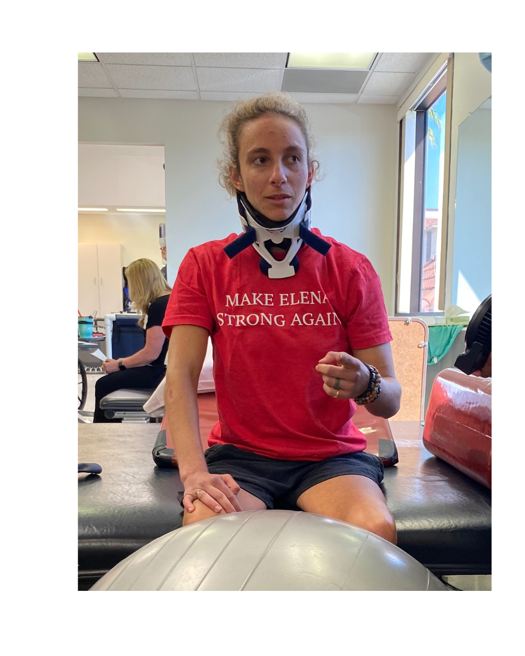 Woman in a red shirt post traumatic accident