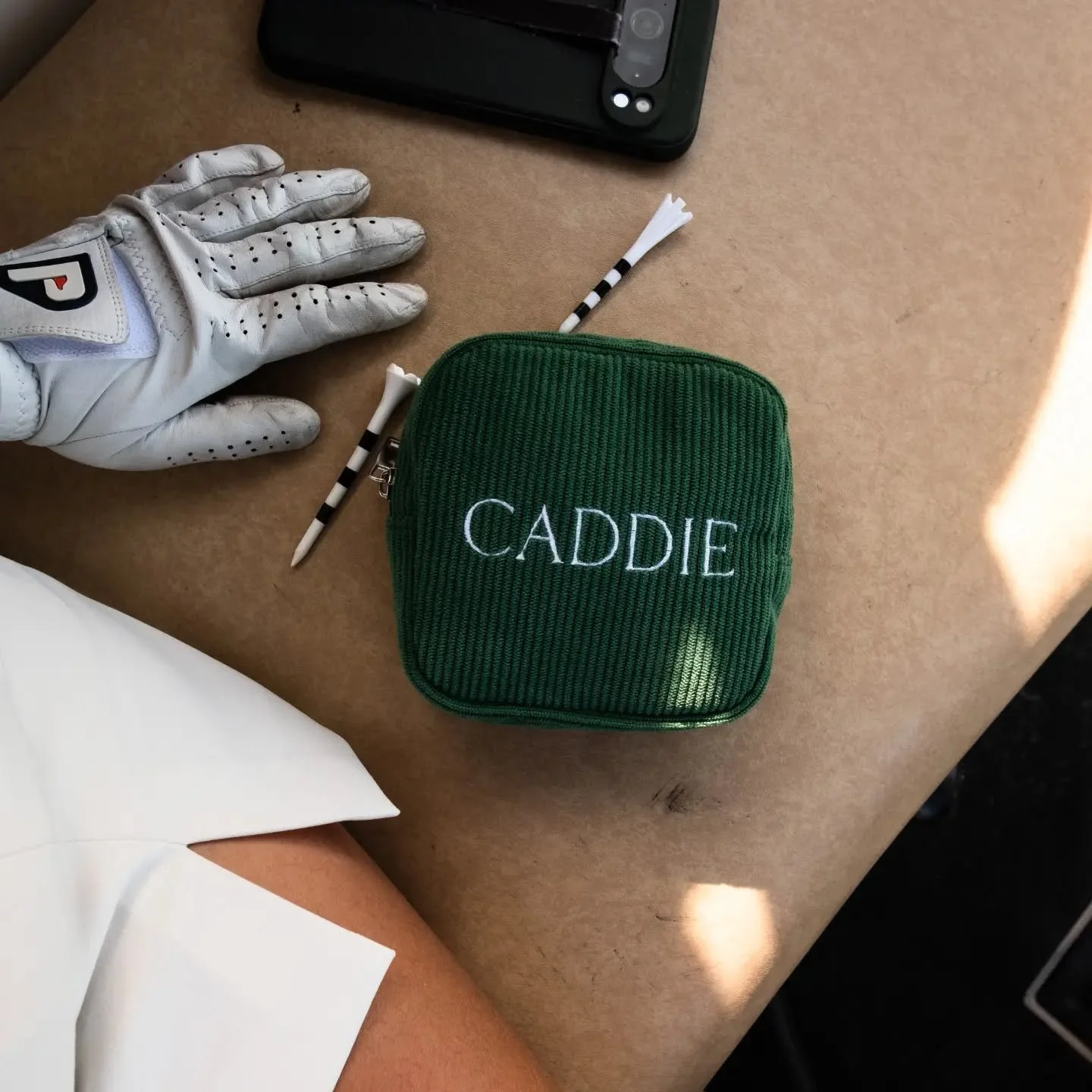 Always looking for your ball marker? Digging through your bag for your chapstick? Somehow losing your tees every round?

We&rsquo;ve all been there.

The Caddie Pouch was made to be your little helper on the course, keeping all those small essentials
