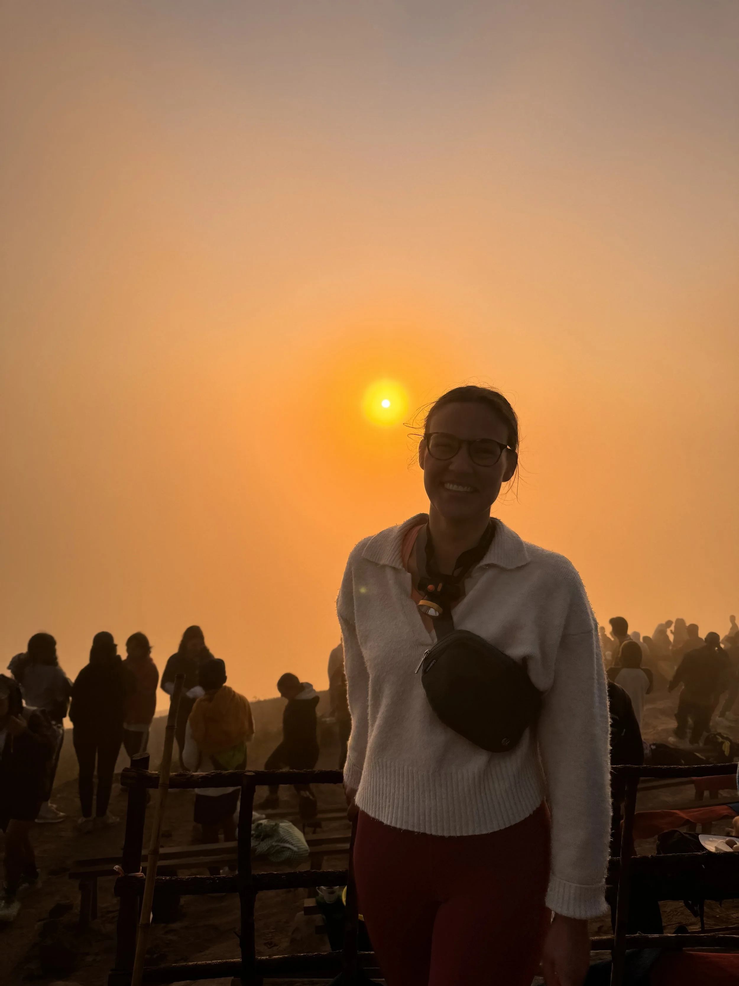 Female traveller hiking for sunrise