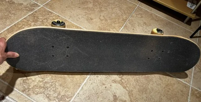 Skateboard deck with wheels AUG2026.jpeg