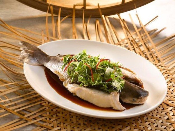 Whole Steamed Fish (鱼 yú) - Prosperity and Abundance