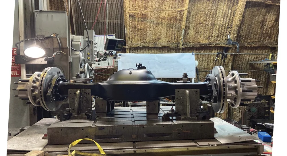 Rear axle housing fixtured on the horizontal boring mill