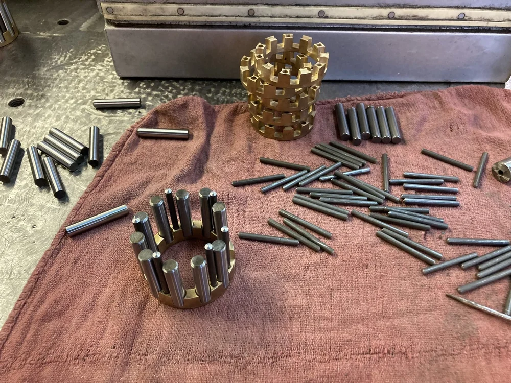 Bronze roller cage and ground pins, precision detail