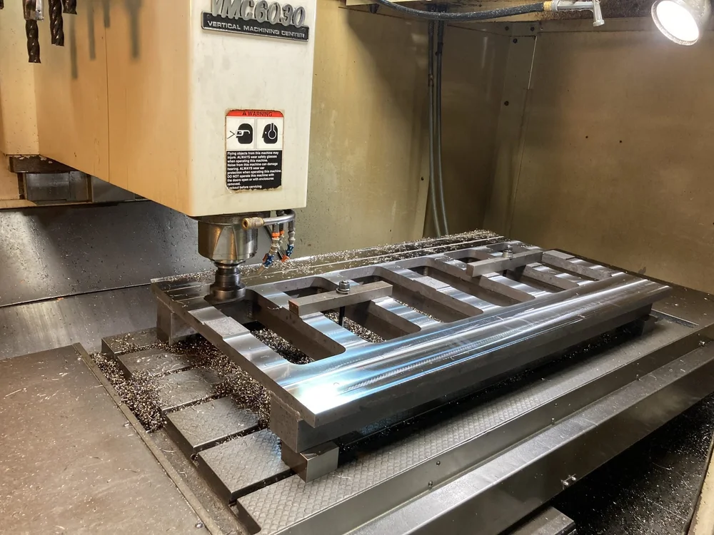 Fixture plate in-process on a vertical machining center