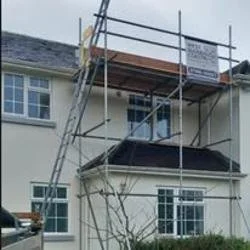 Residential scaffolding providing safe access to the upper floor and roofline for property maintenance and repair works. West Sussex Coastal Scaffolding Ltd.