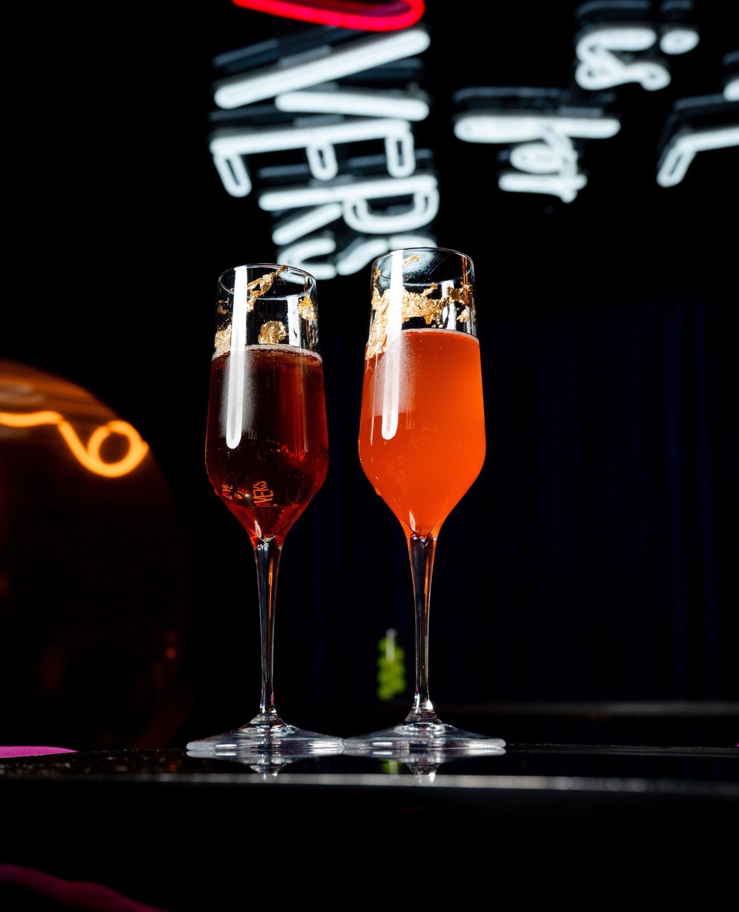 Yours &amp; mine 🥂✨ A paired prosecco moment made for two.⁠
⁠
One bright + floral. One deep + sultry. Shiraz gin, grapefruit syrup, elderflower liqueur, grenadine - topped with prosecco and finished in edible gold.⁠
⁠
Gilded Crush + Velvet Vow arriv