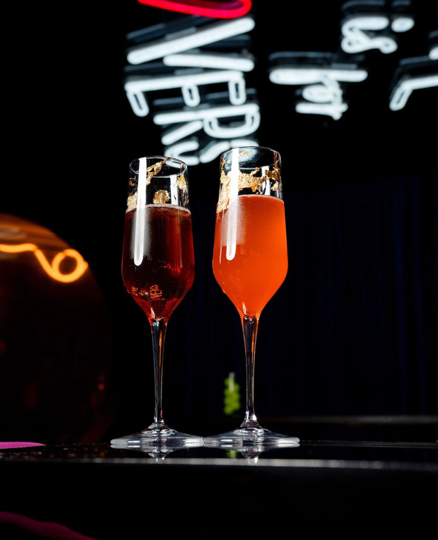 Yours &amp; mine 🥂✨ A paired prosecco moment made for two.⁠
⁠
One bright + floral. One deep + sultry. Shiraz gin, grapefruit syrup, elderflower liqueur, grenadine - topped with prosecco and finished in edible gold.⁠
⁠
Gilded Crush + Velvet Vow arriv