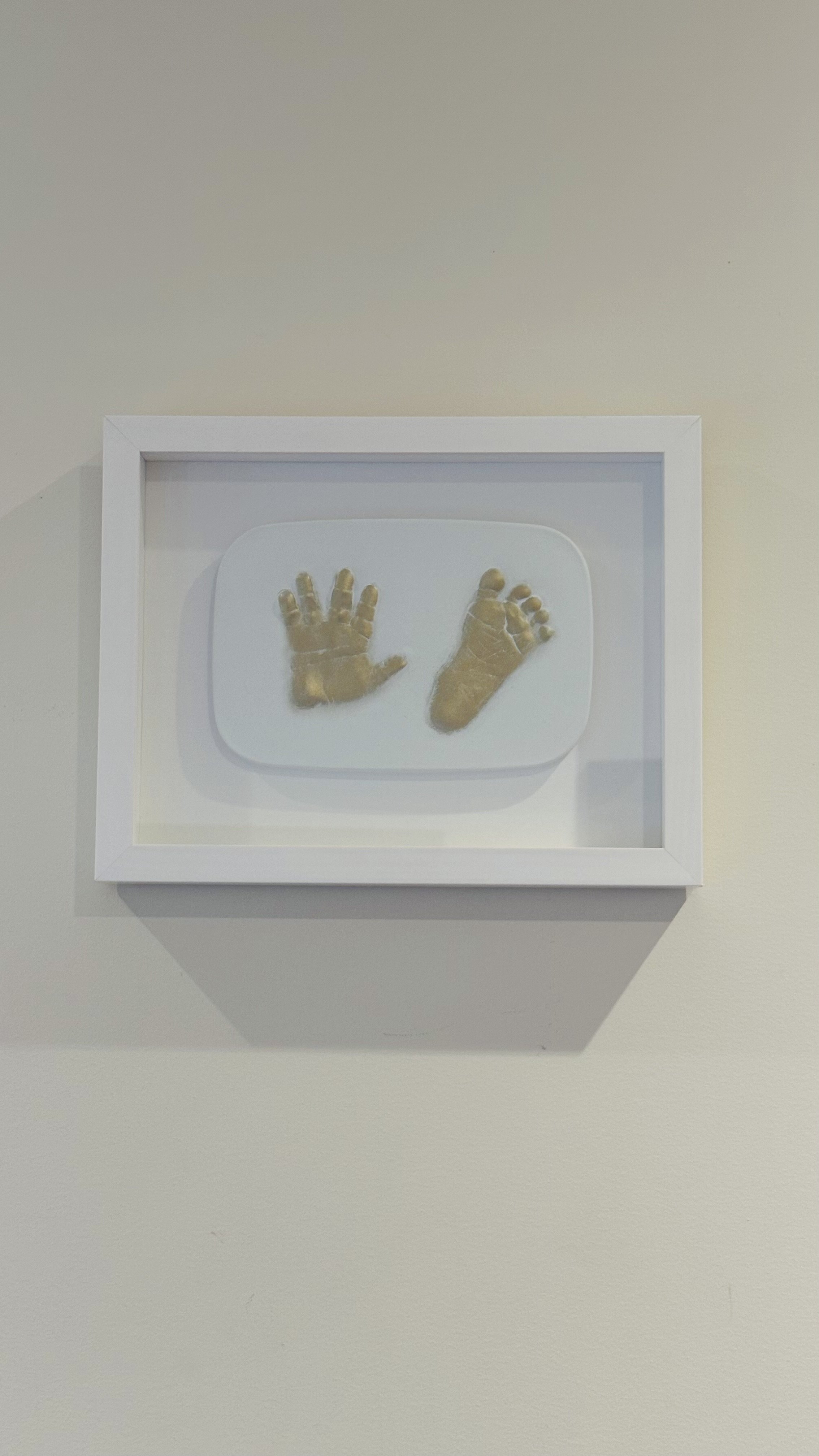 front-plaster-impression-baby-handprint-footprint.JPG