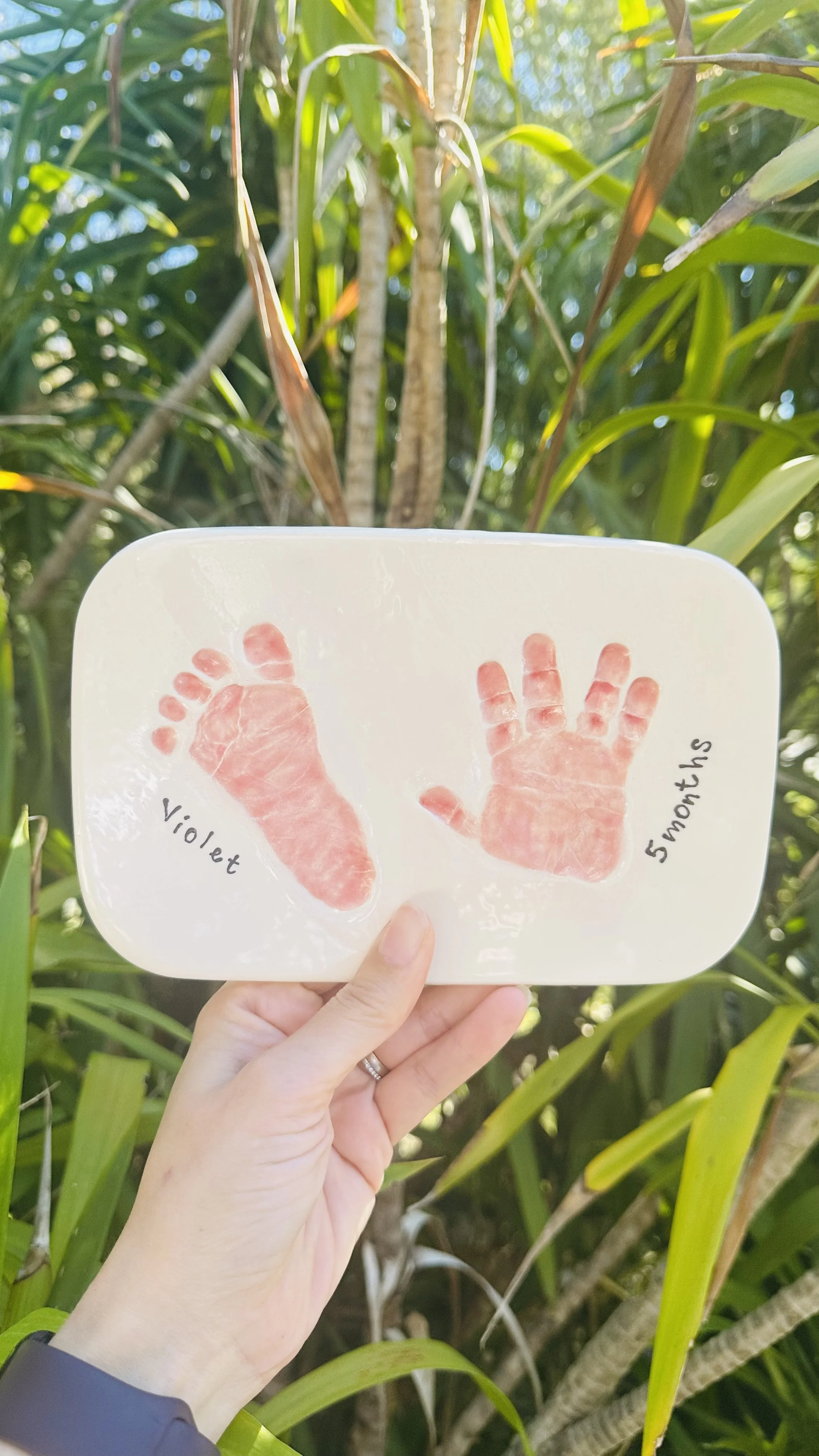 Double Hand and Footprint in Clay