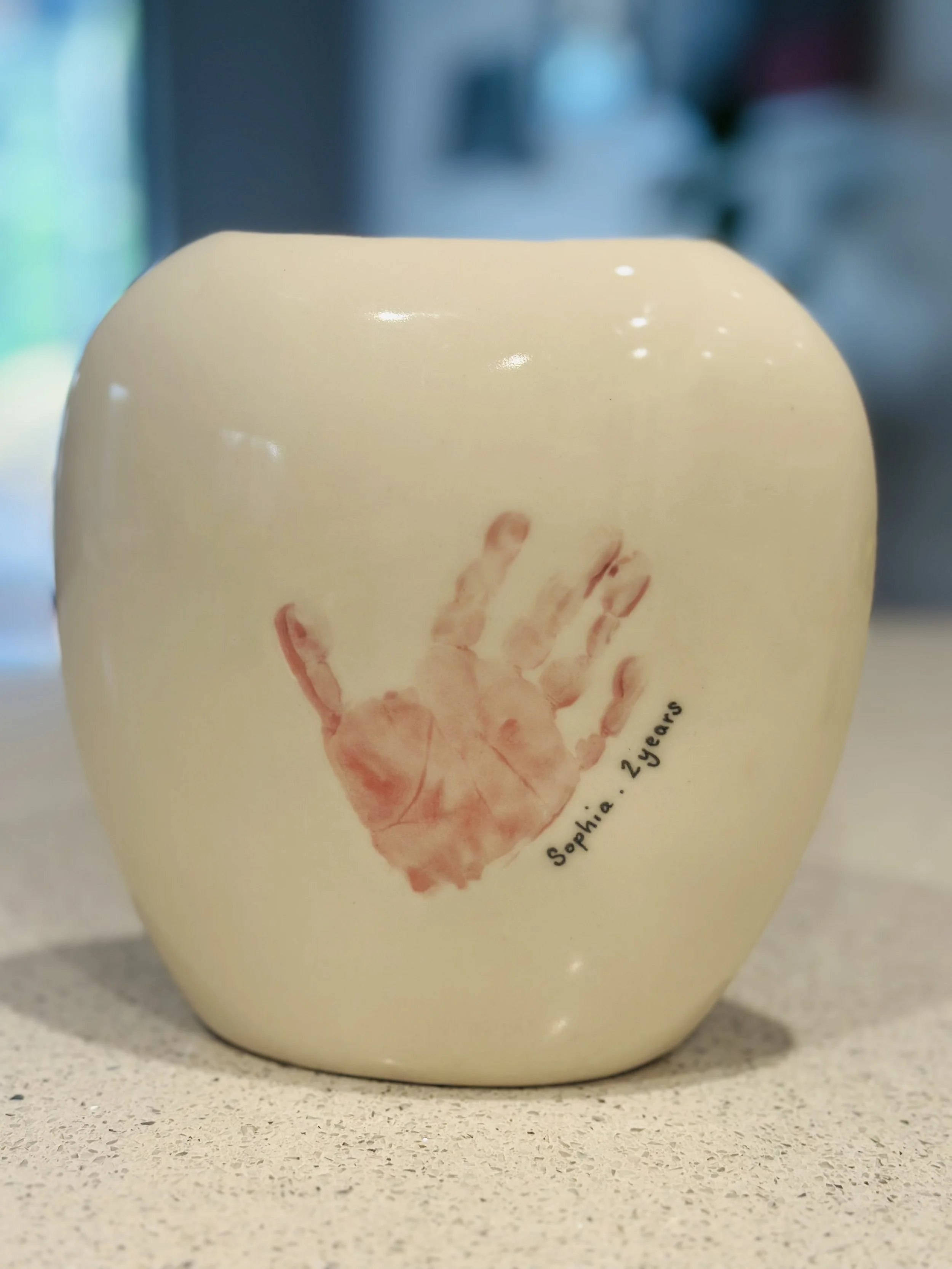 pillow-vase-baby-handprint-ceramic-keepsake.jpg