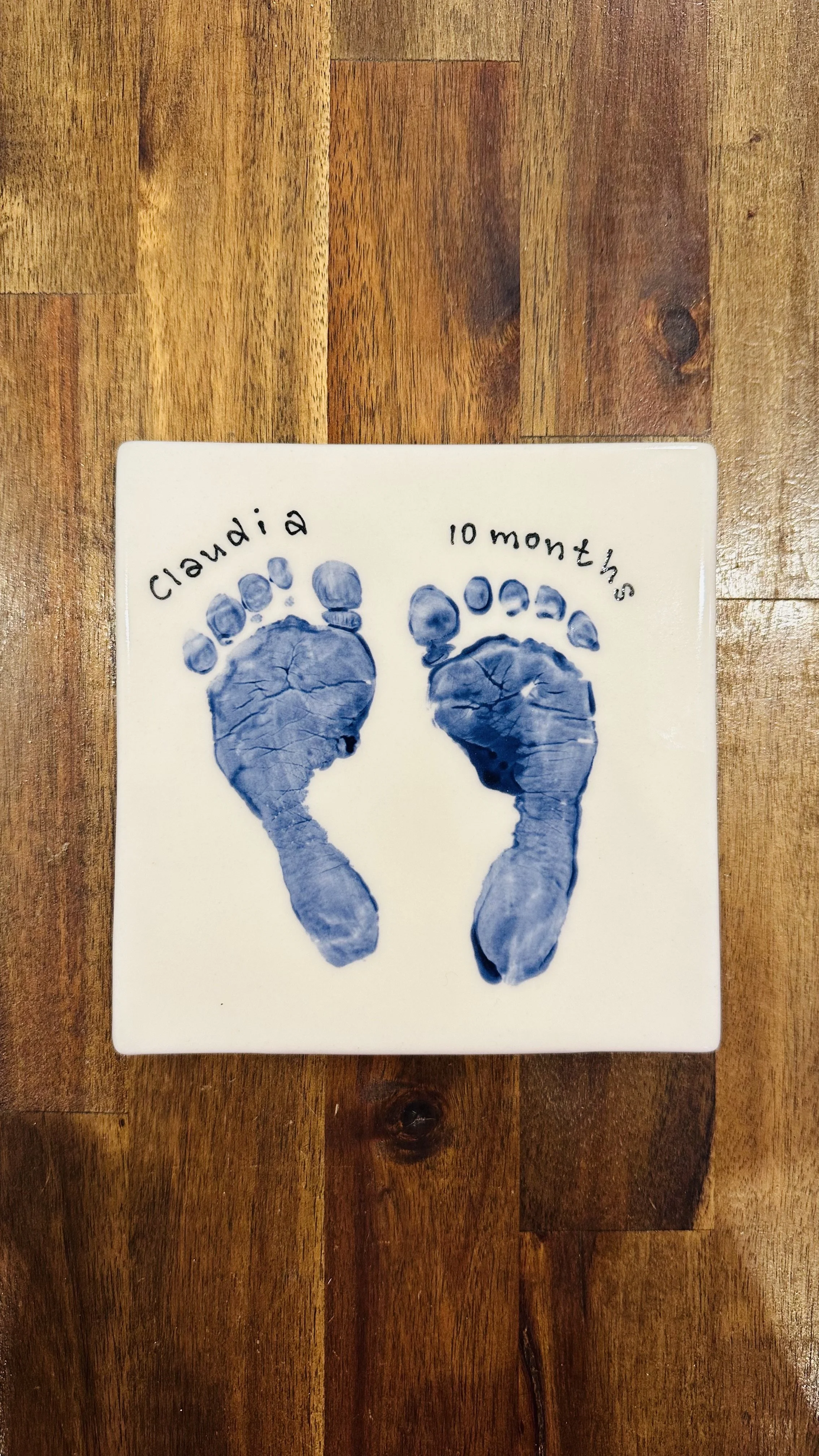 blue-footprint-handprint-ceramic-tile.jpg