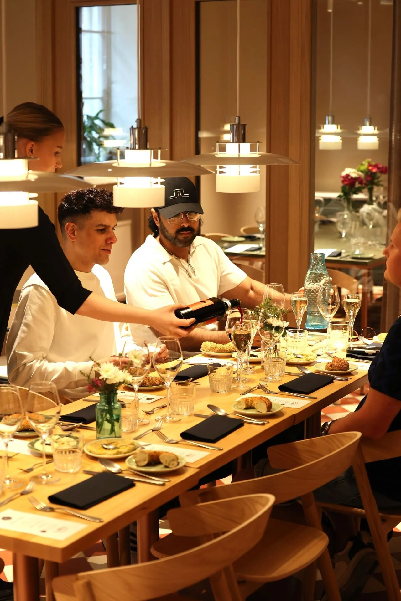 Men having dinner in Helsinki, restaurant LaBra