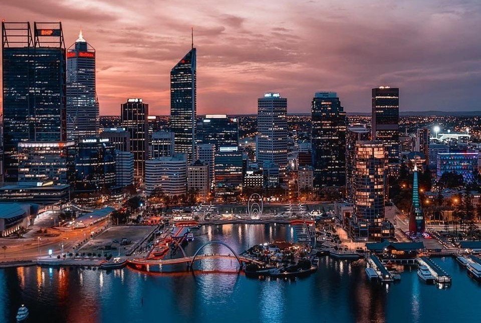 Perth city skyline at sunset – commercial cleaning and property maintenance services across offices, retail, gyms, and industrial sites.