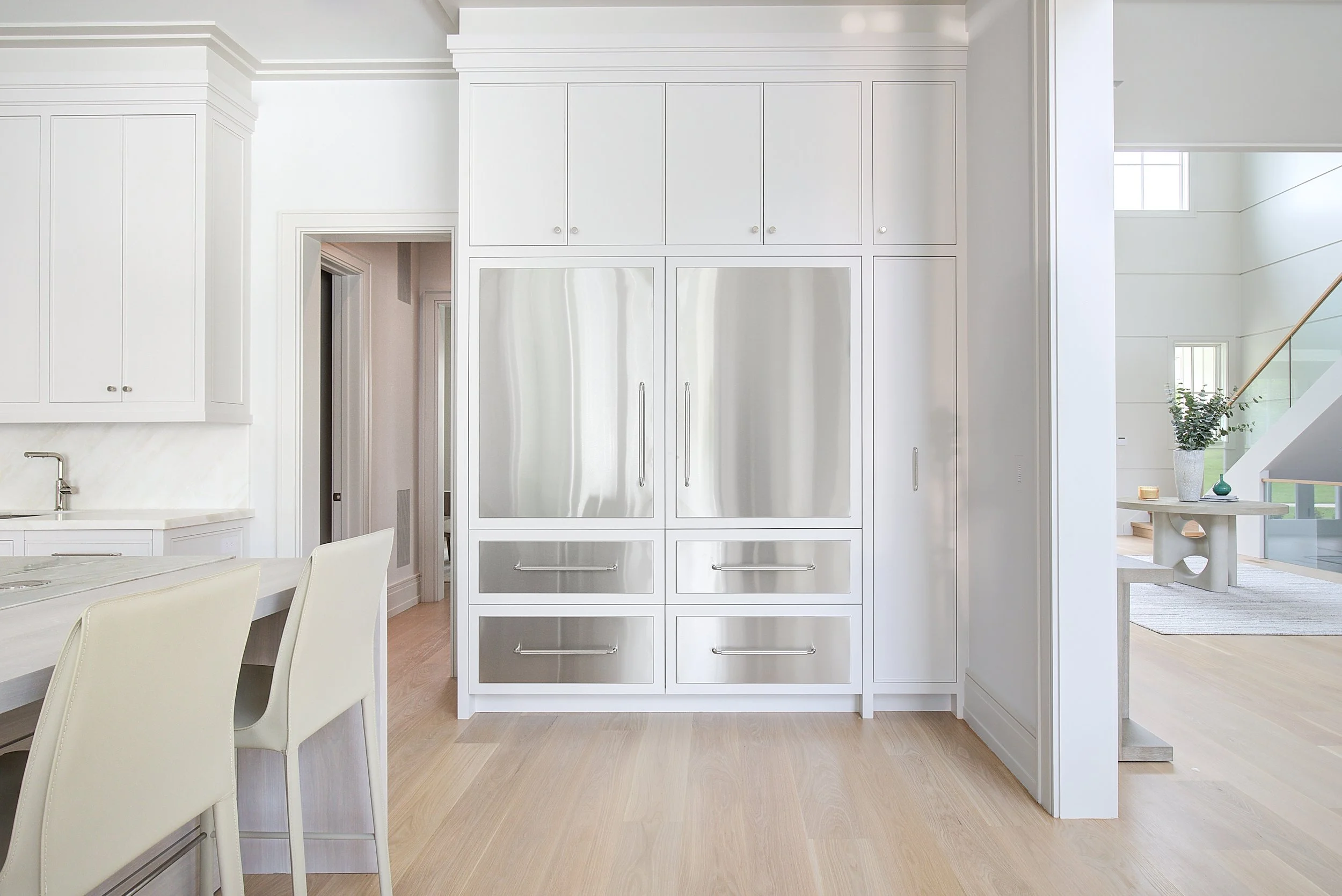 Clean Serene Hamptons Madison Kitchen Cabinetry Stainless Panels.jpg