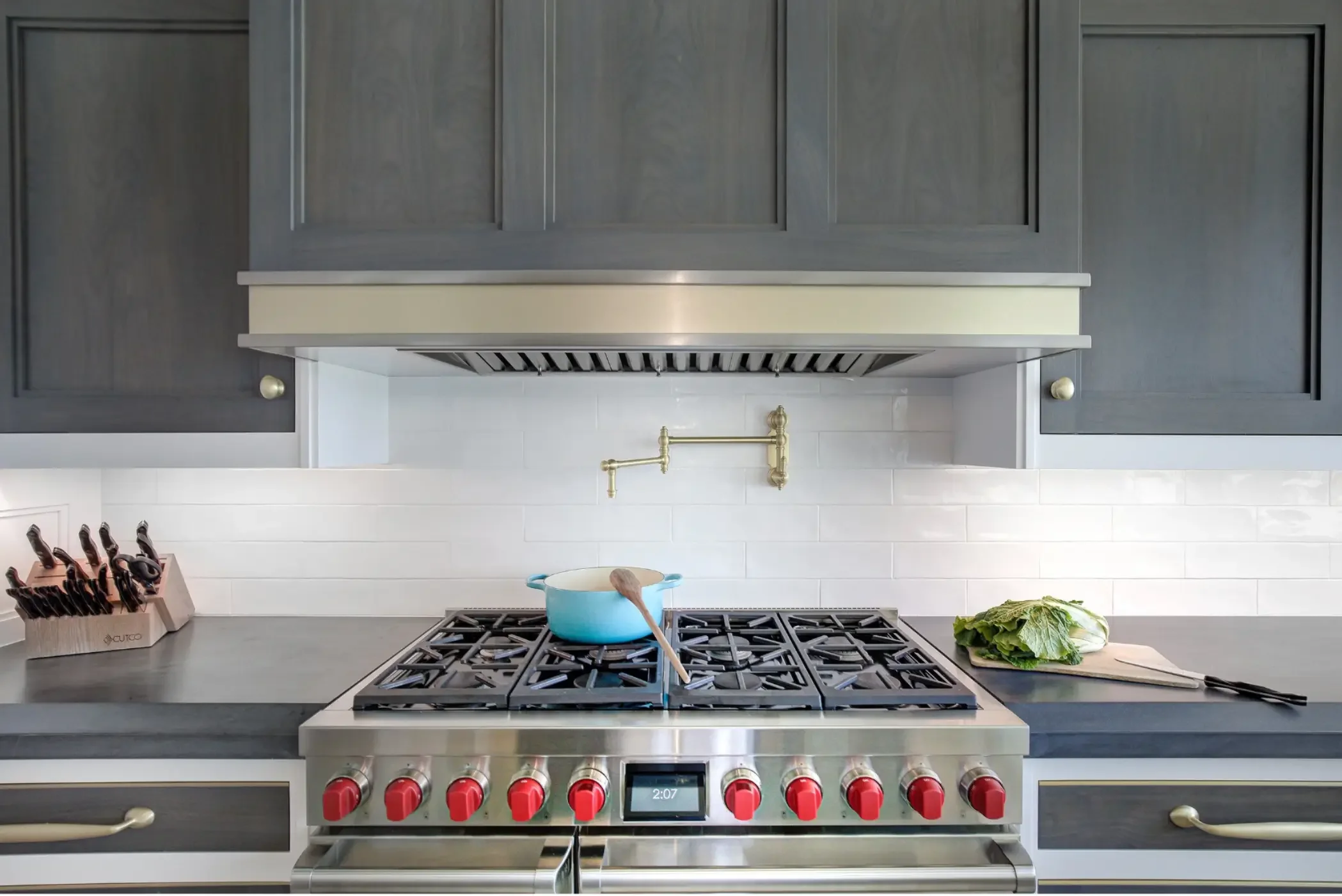 cinder-walnut-brass-range-hood.webp