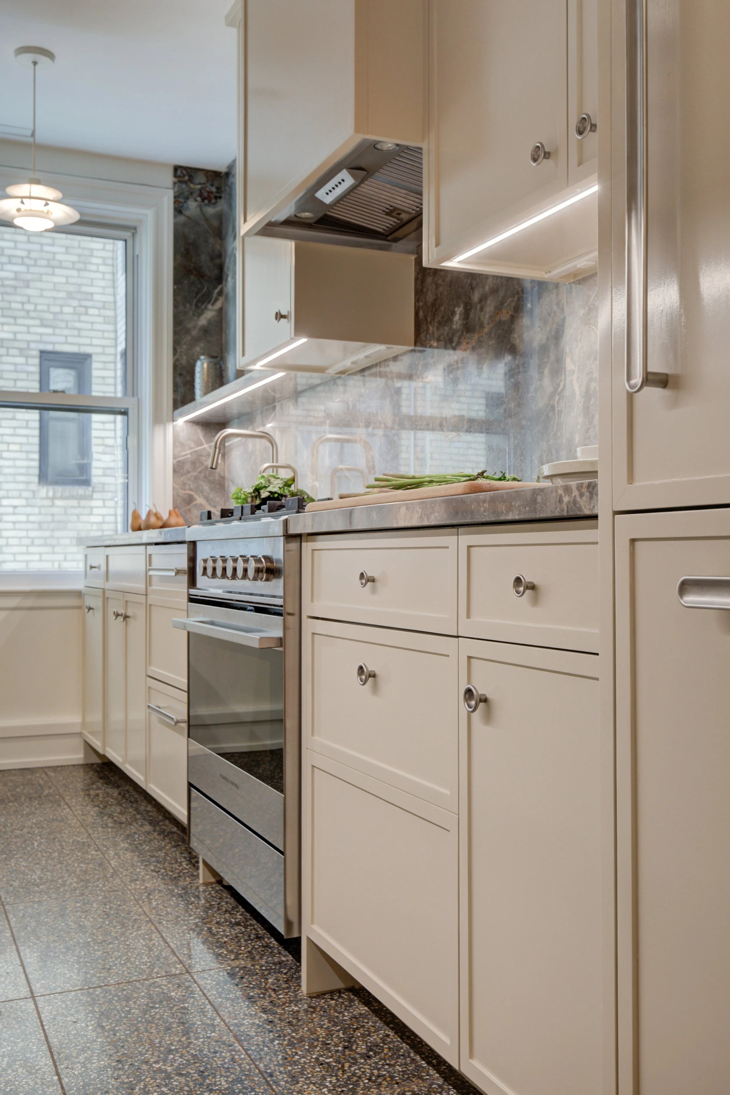Urban Galley NYC Kitchen Madison Cabinetry Fisher Paykel Range.jpg