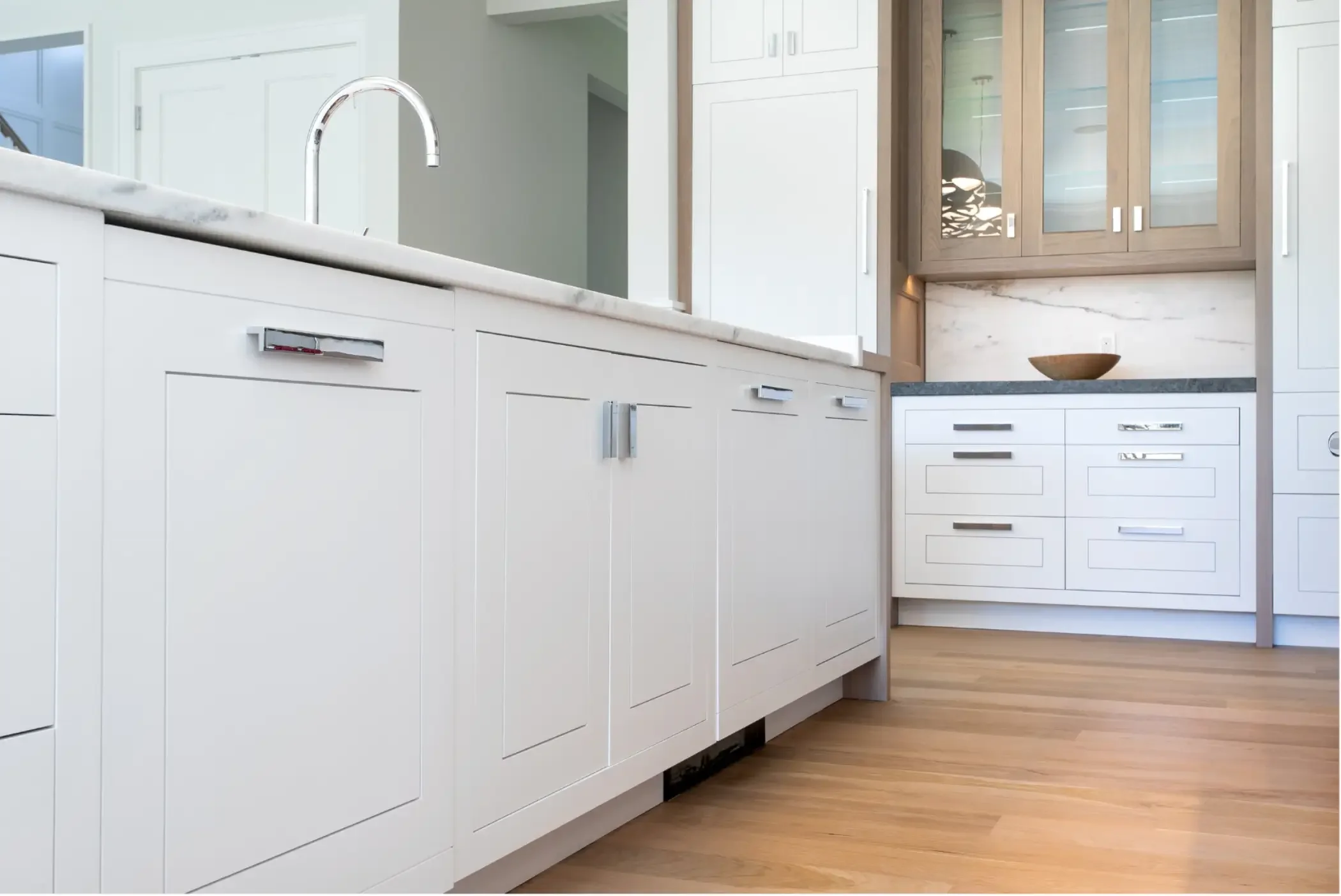 white-revelane-base-island-cabinets.webp