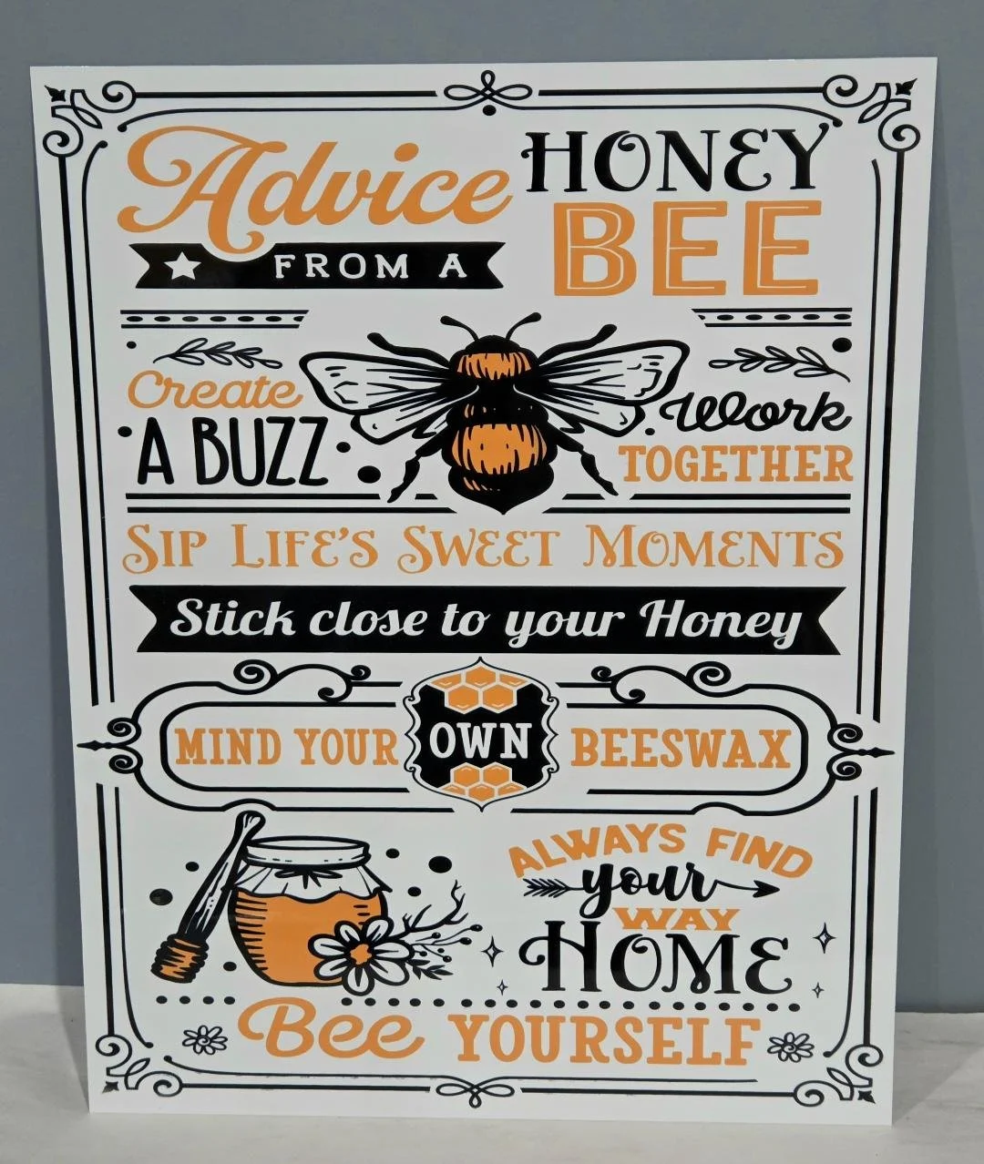 Advice From A Honey Bee tin sign.jpg