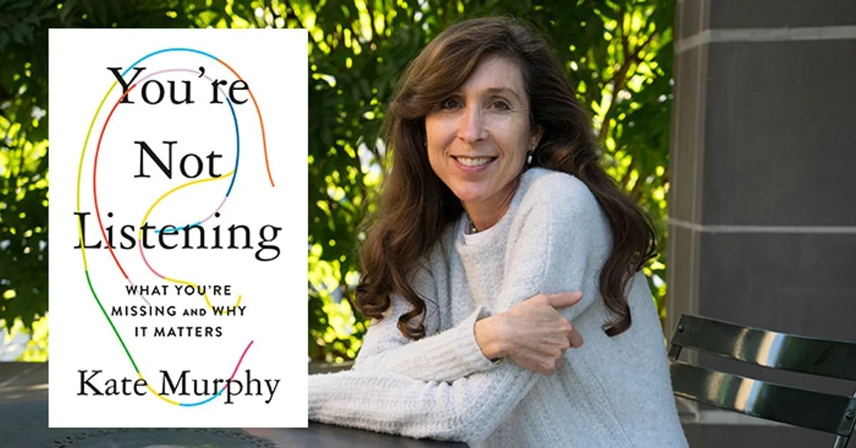 Book cover titled "You're Not Listening" with colorful lines around the text, and a woman with long brown hair wearing a white sweater, sitting outdoors near greenery.