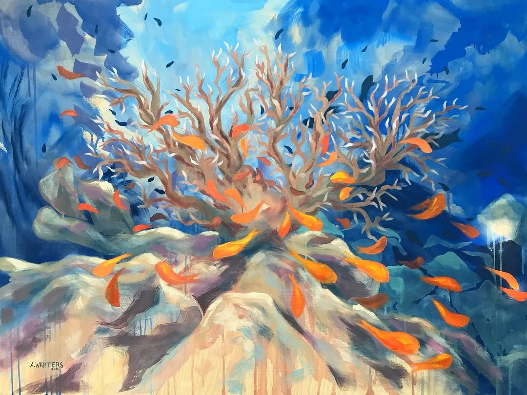 A vibrant underwater scene featuring a coral reef with orange fish swimming around it and a blue ocean background.