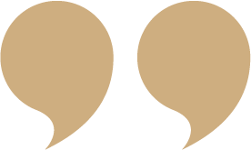 Two beige quotation marks on a white background.