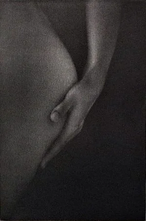Close-up mezzotint by Mikio Watanabe of a woman's hand resting on their thigh in black and white.