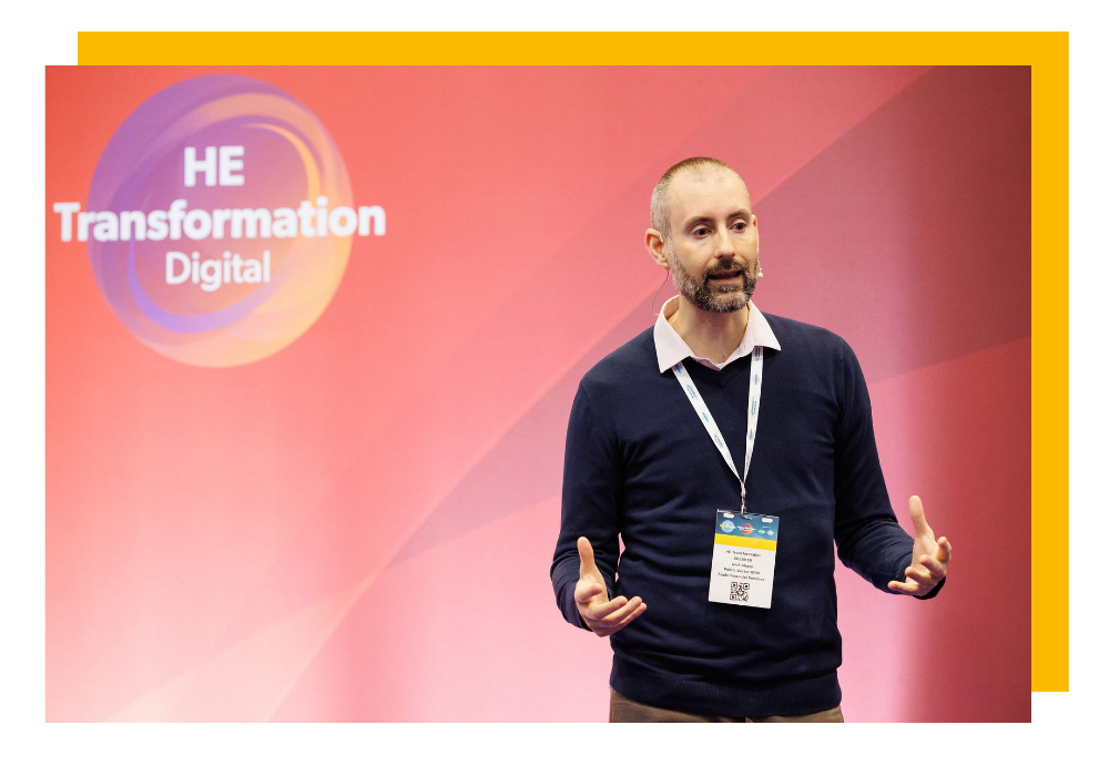 A speaker in front of the HE Transformation Digital stage