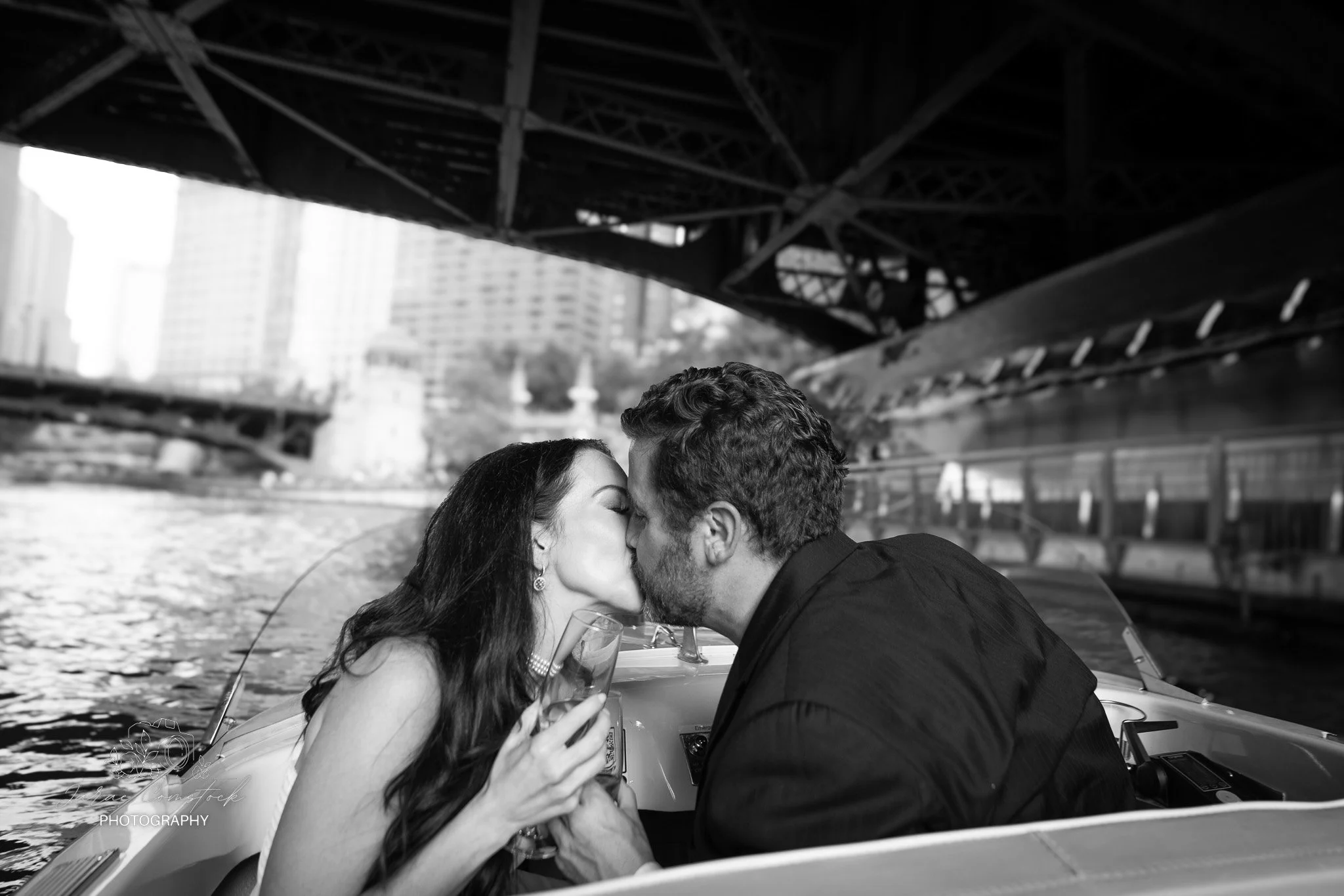 Jarae Comstock Wedding and Engagement Photographer captures romantic vintage ralph lauren engagement session on vintage boat on Chicago River