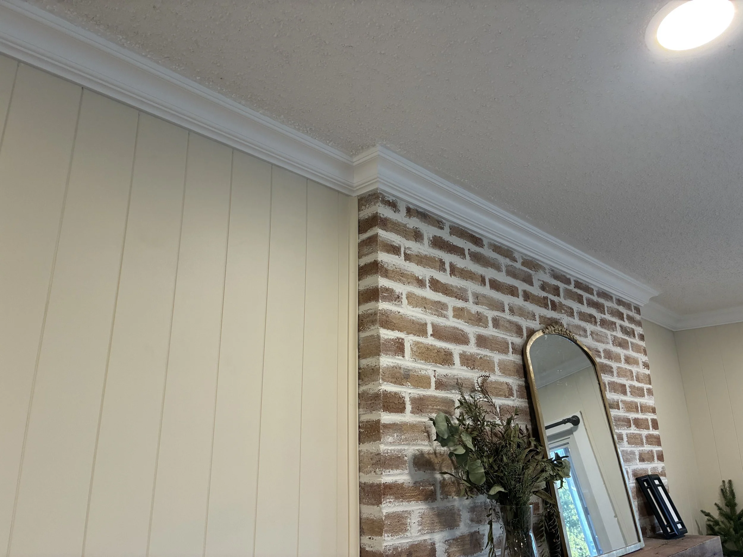 Custom tongue and groove paneling with crown molding by 5280 Home Design LLC