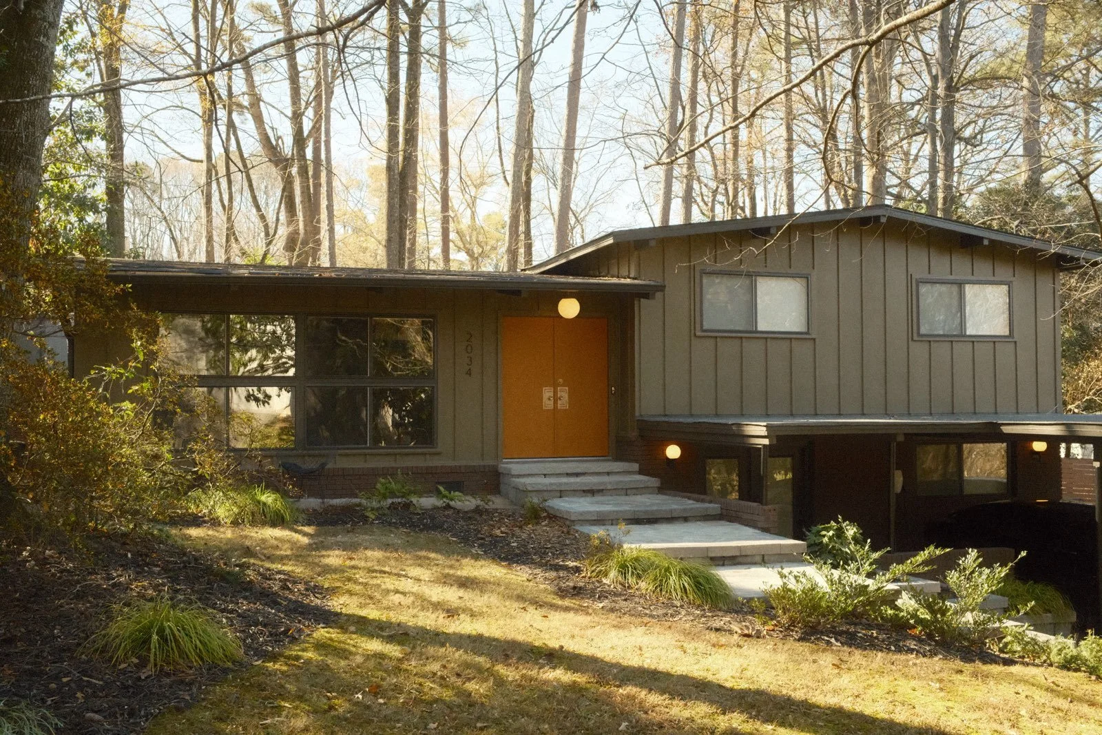 Full exterior shot of the house unflipped and back a period accurate color scheme
