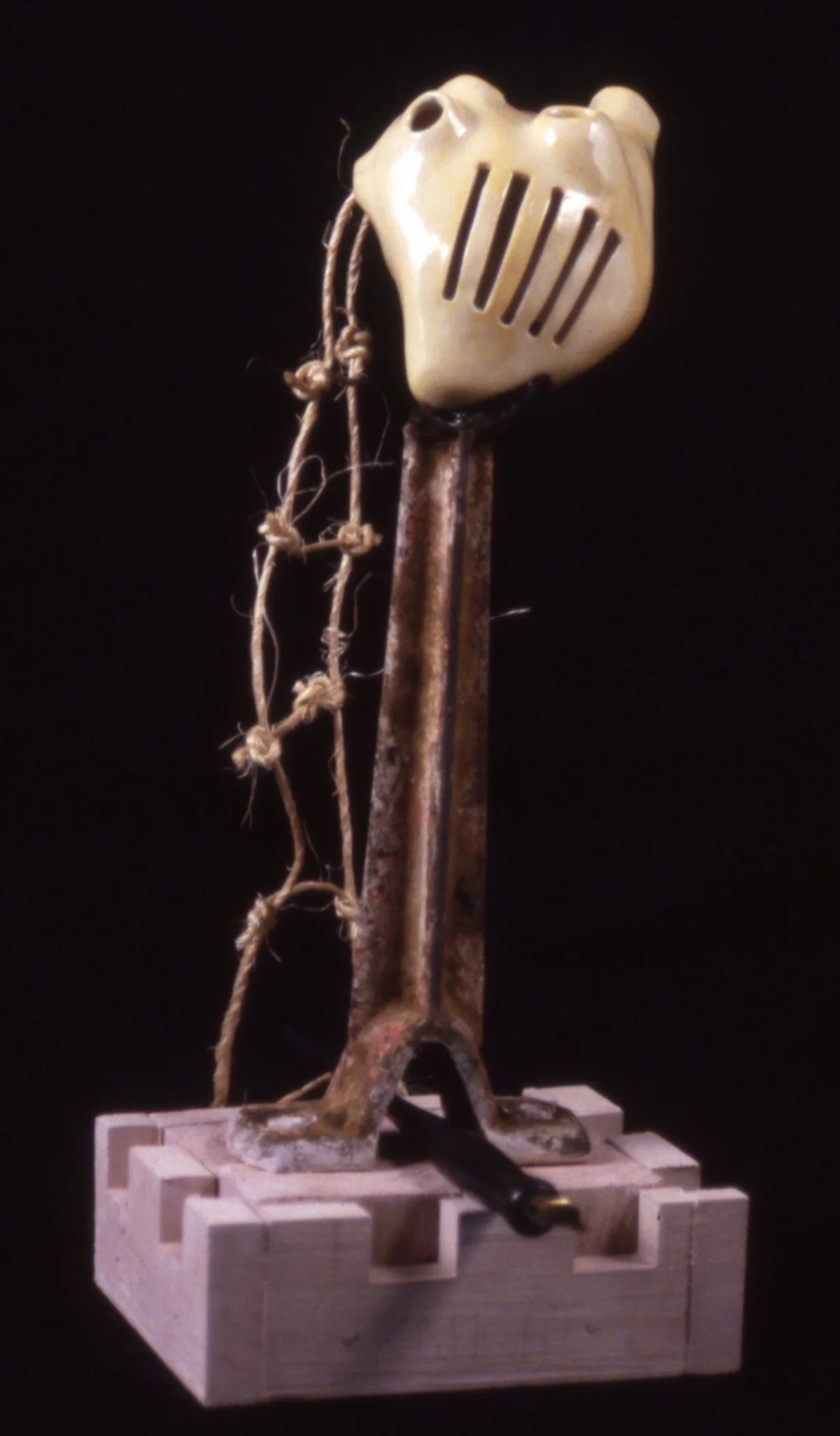 'Nonexistent Knight', porcelain heart, metal, wood, rope, 6" x 12" x 6"