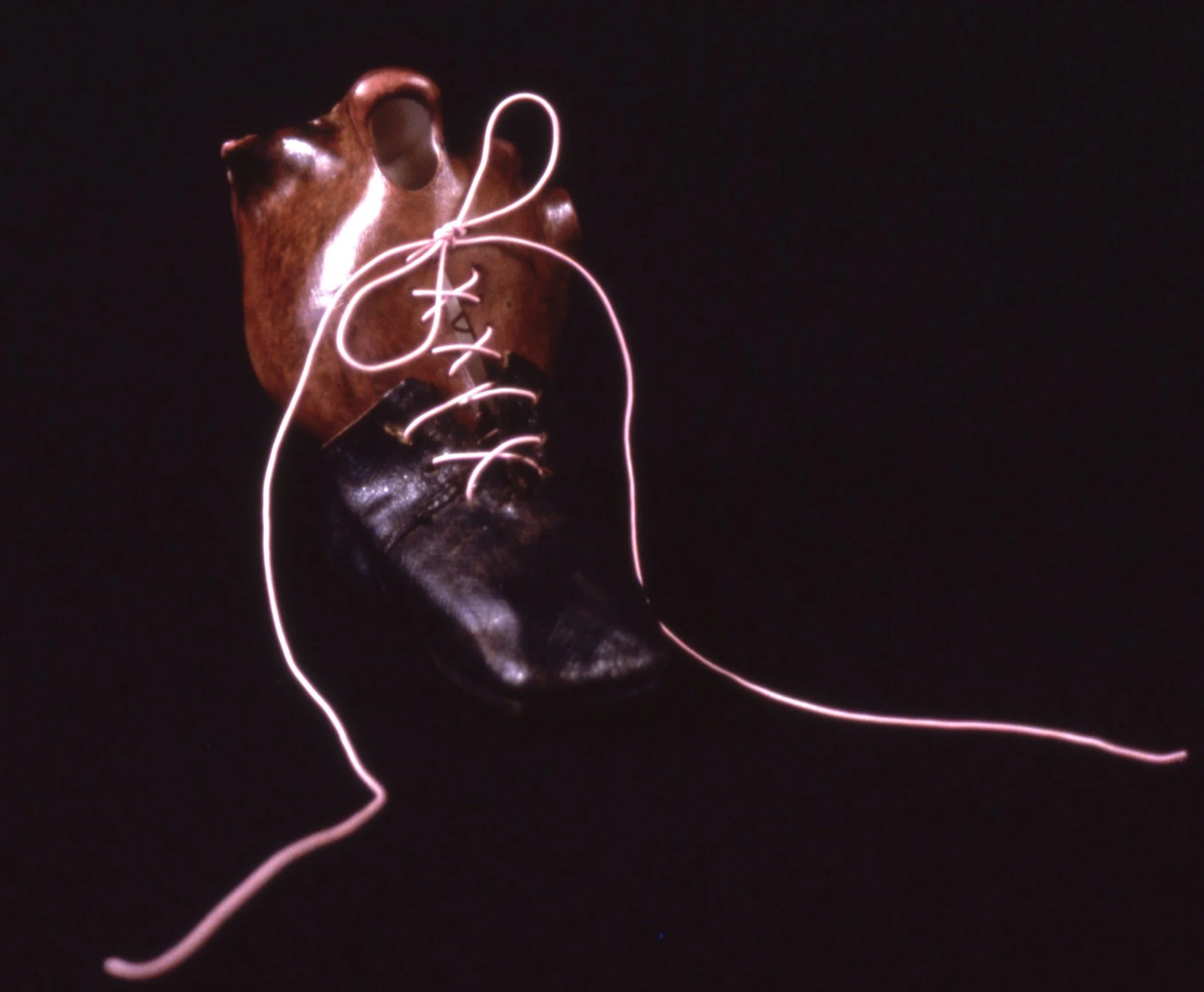 'Immortal', porcelain heart, leather shoe, 9" x 6" x 6"
