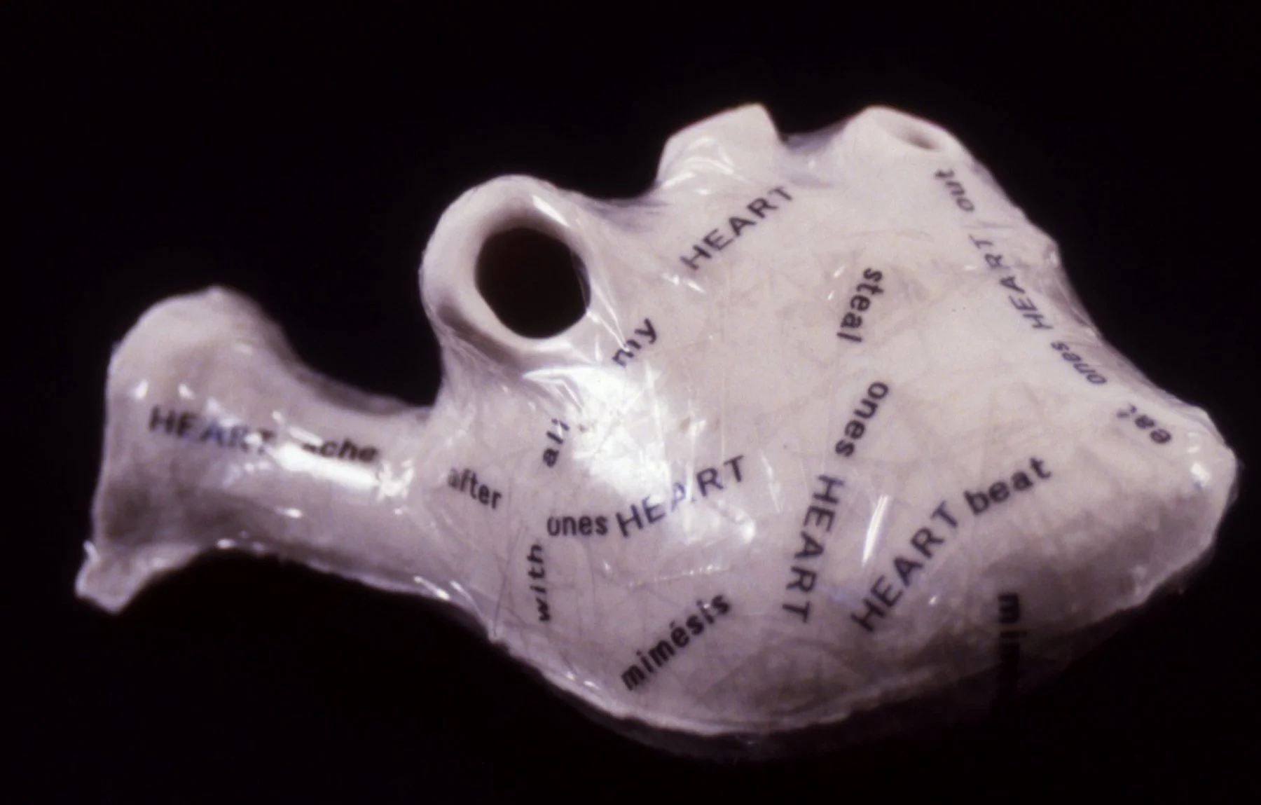 'Mimesis', porcelain heart, tape, 5" x 4" x 4"