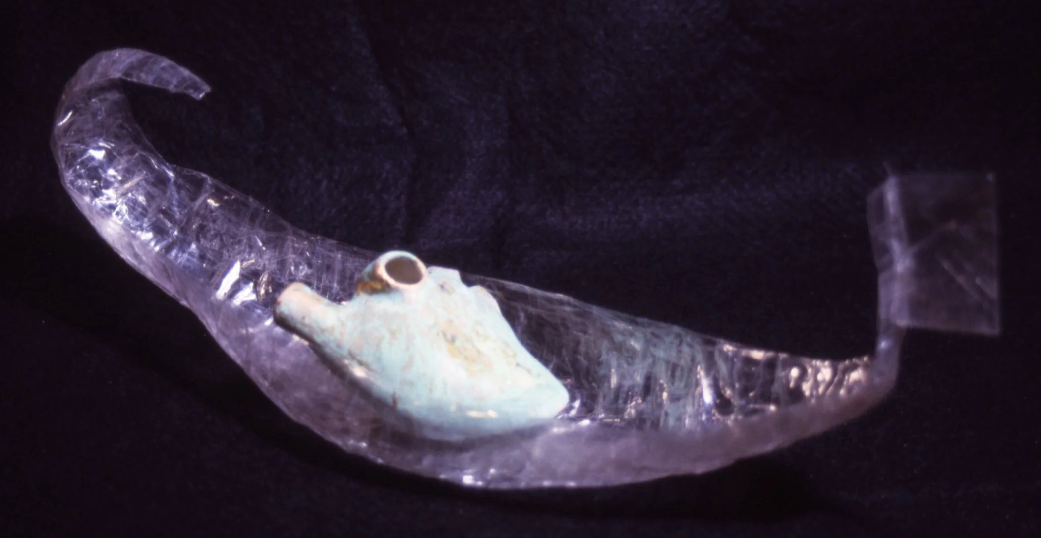 'Ovid's Dream', porcelain heart with petina, scotch tape boat, 16" x 7" x 5"
