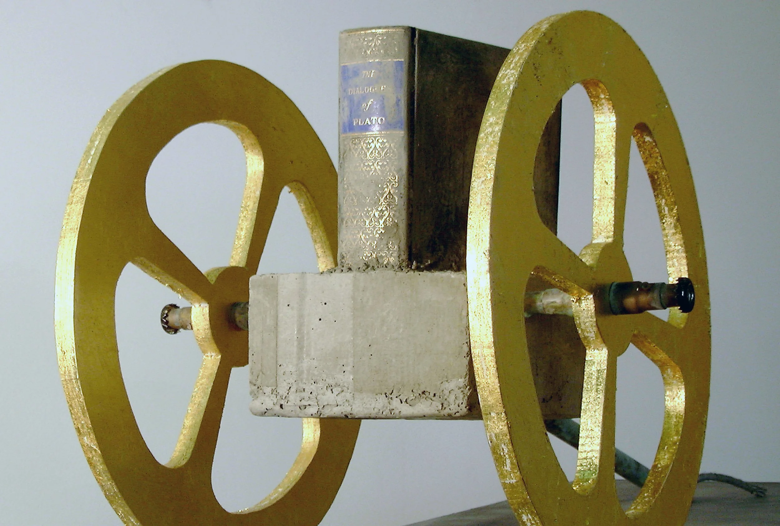 'Plato', Plato's Dialogues 1st edition  embedded in cement, gold leaf wooden wheels, 24" x 30" x 24"