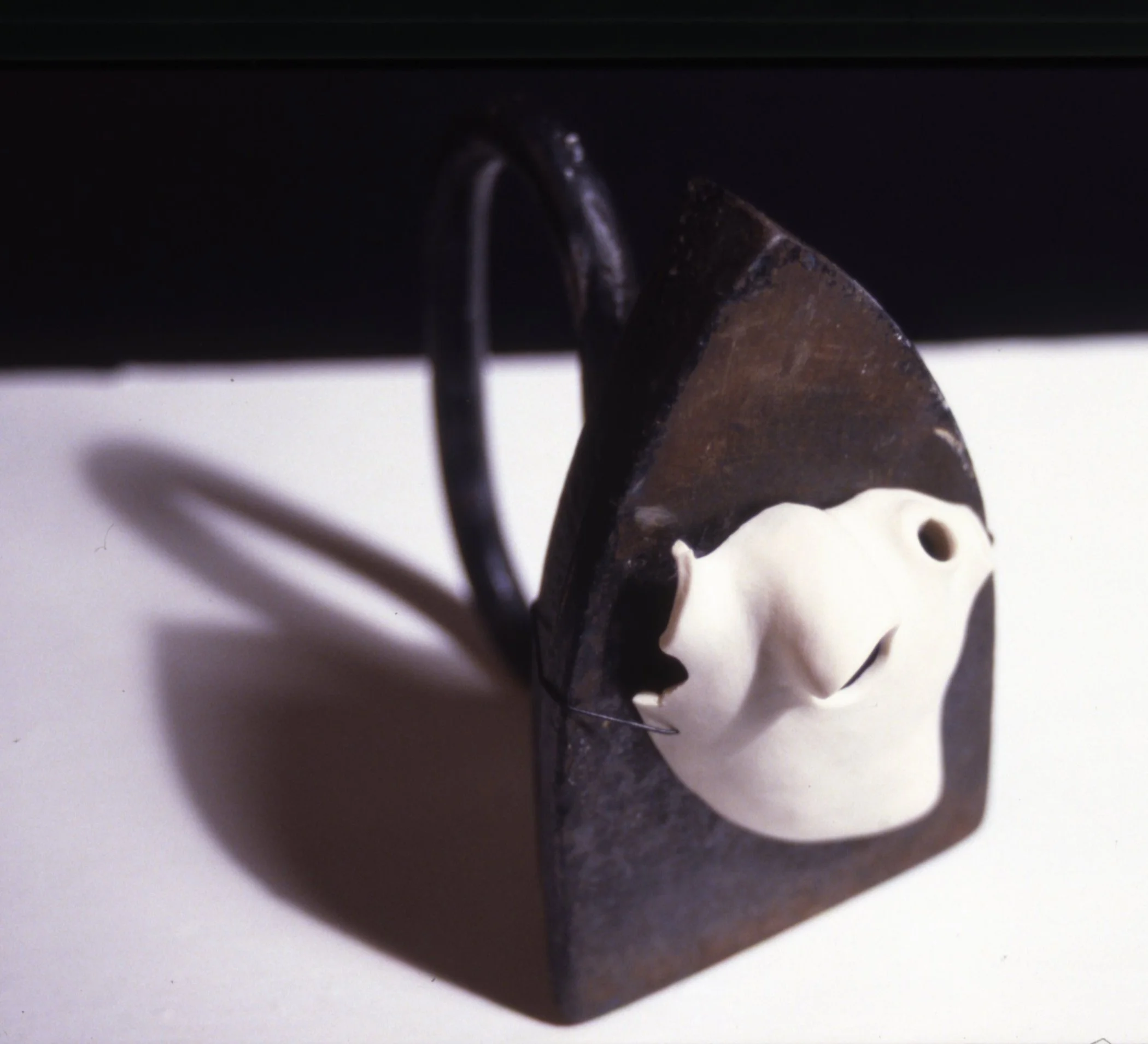 'Impression', porcelain heart, iron, 7" x 10" x 8"