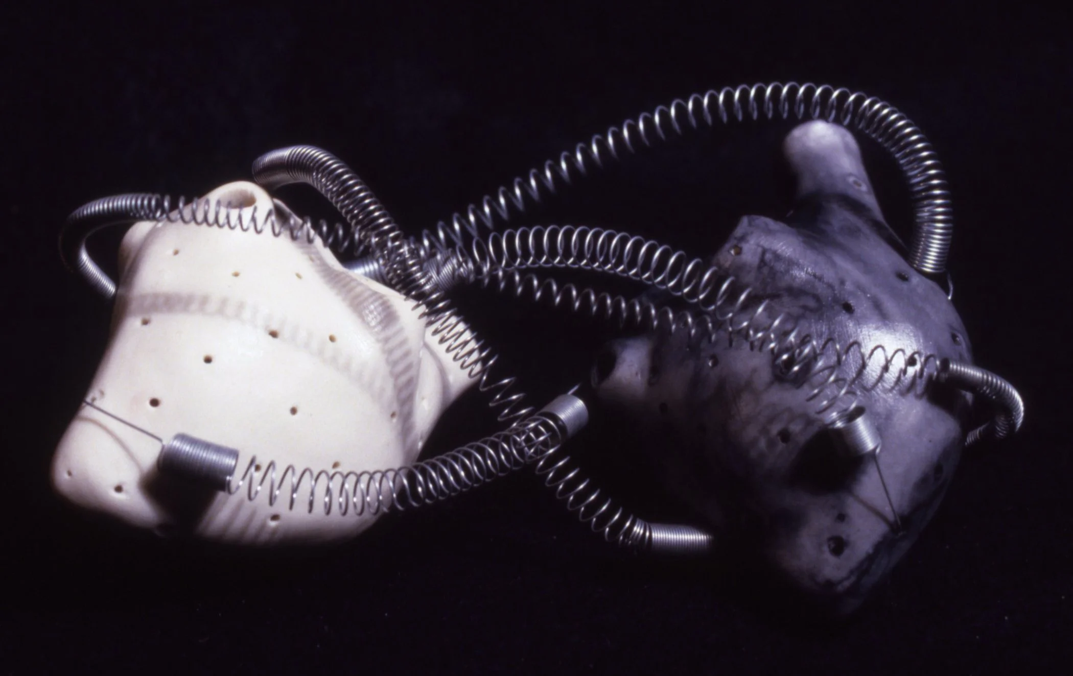 'Yin + Yang', porcelain hearts, coils, 7" x 5" x 5" (private collection)