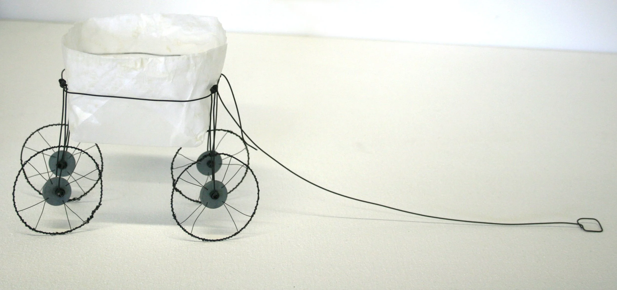 'Chariot, 6" x 20" x 6", wire + glassine paper