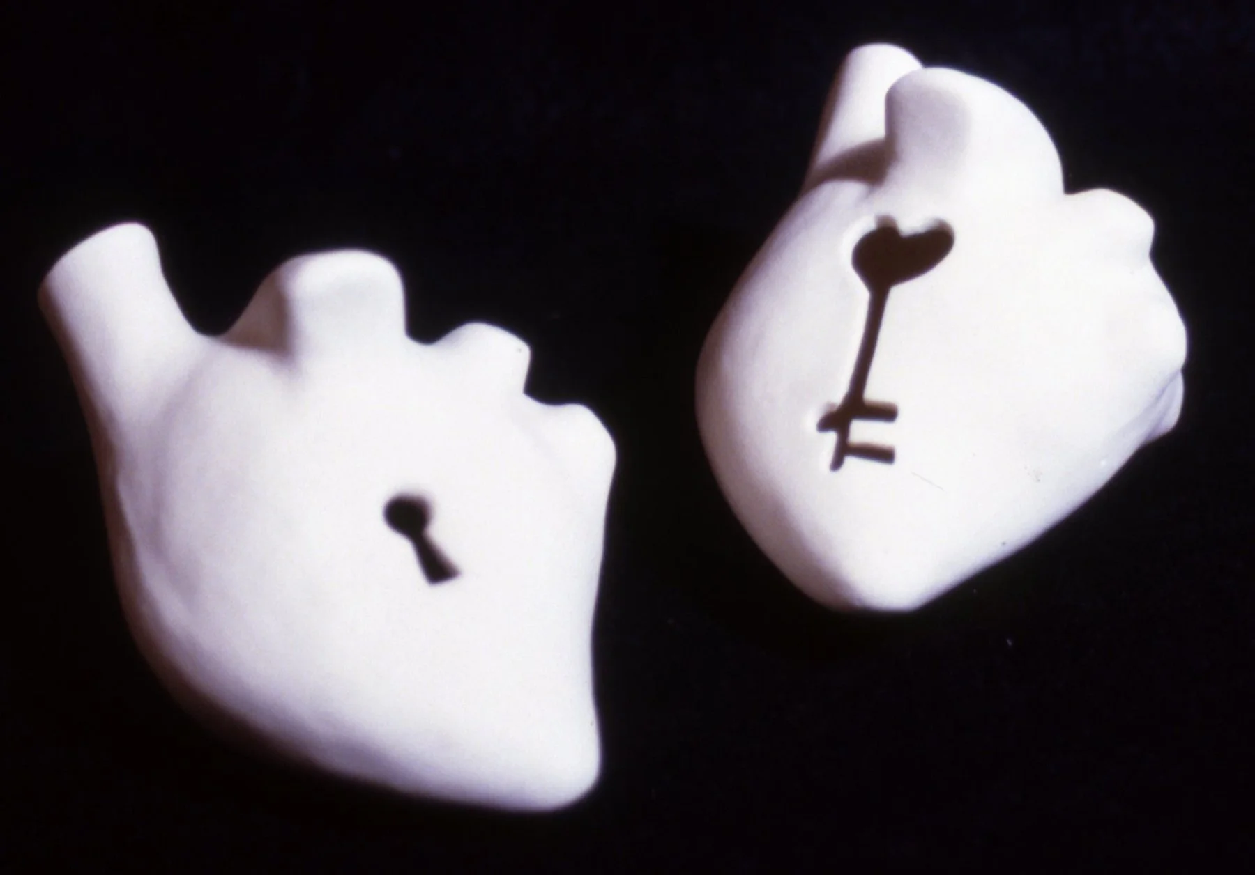 'Unlock', 2 porcelain hearts, each 5" x 4" x 4"