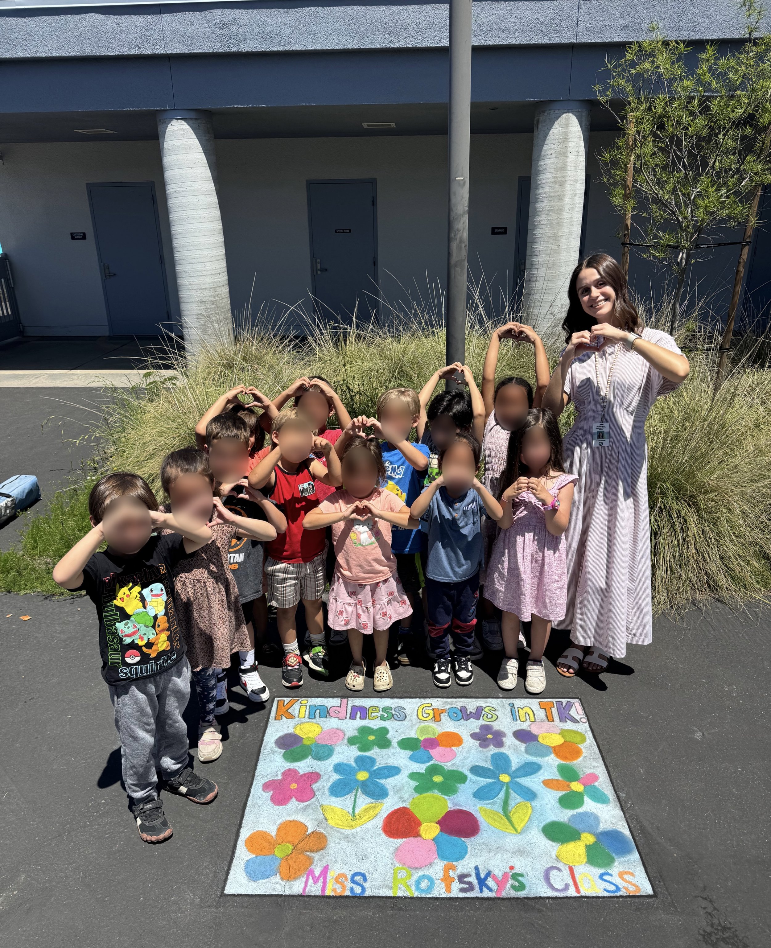 My students and I with their creation for our school’s annual Chalk Fest. Our project was titled “Kindness Grows in TK.” This project highlights two major themes we explored this year. We learned about kindness as part of our social-emotional learnin