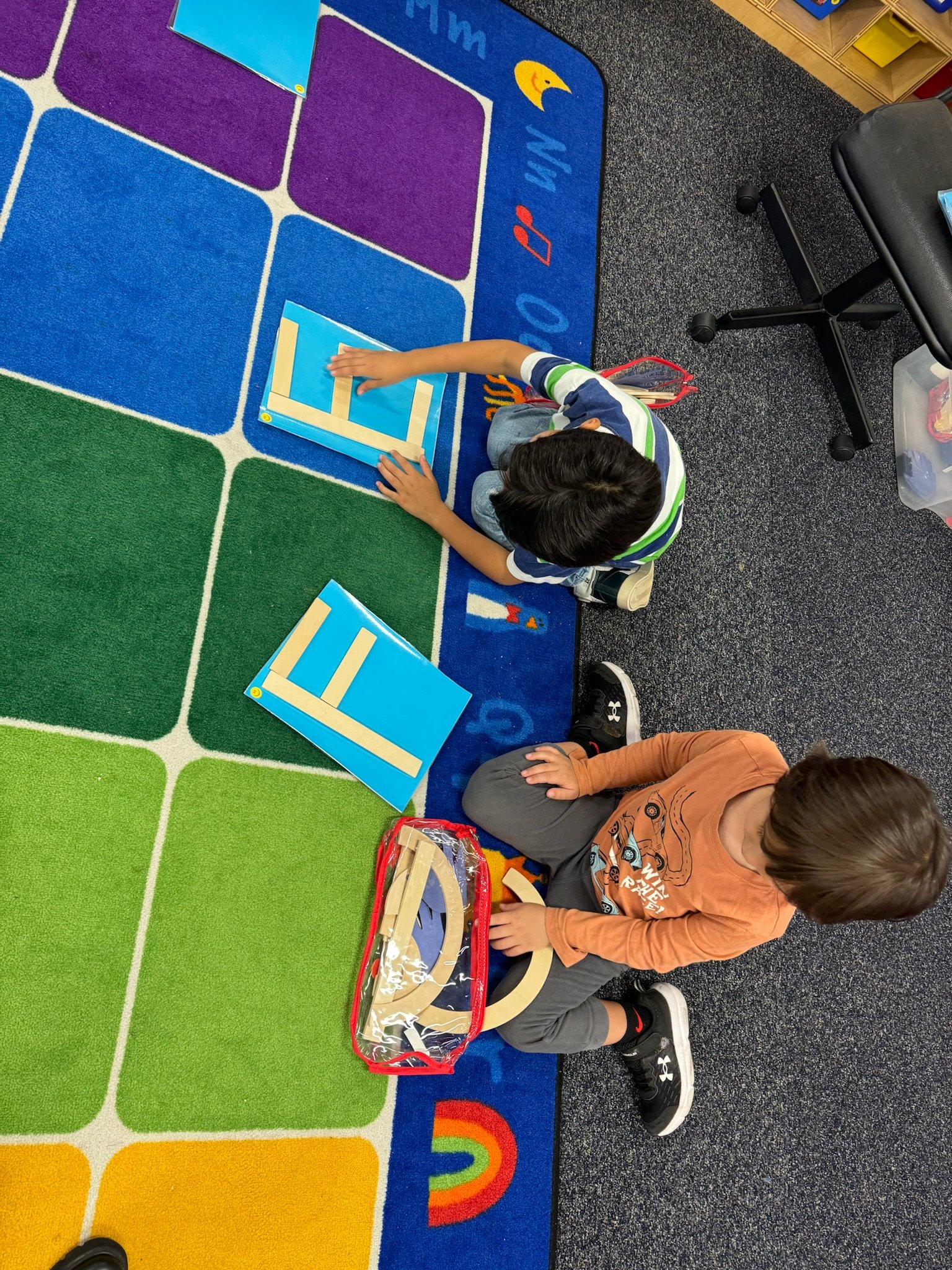 My TK students building letters with curves and lines as I give them a letter sound, asking them to identify and build the corresponding letter.