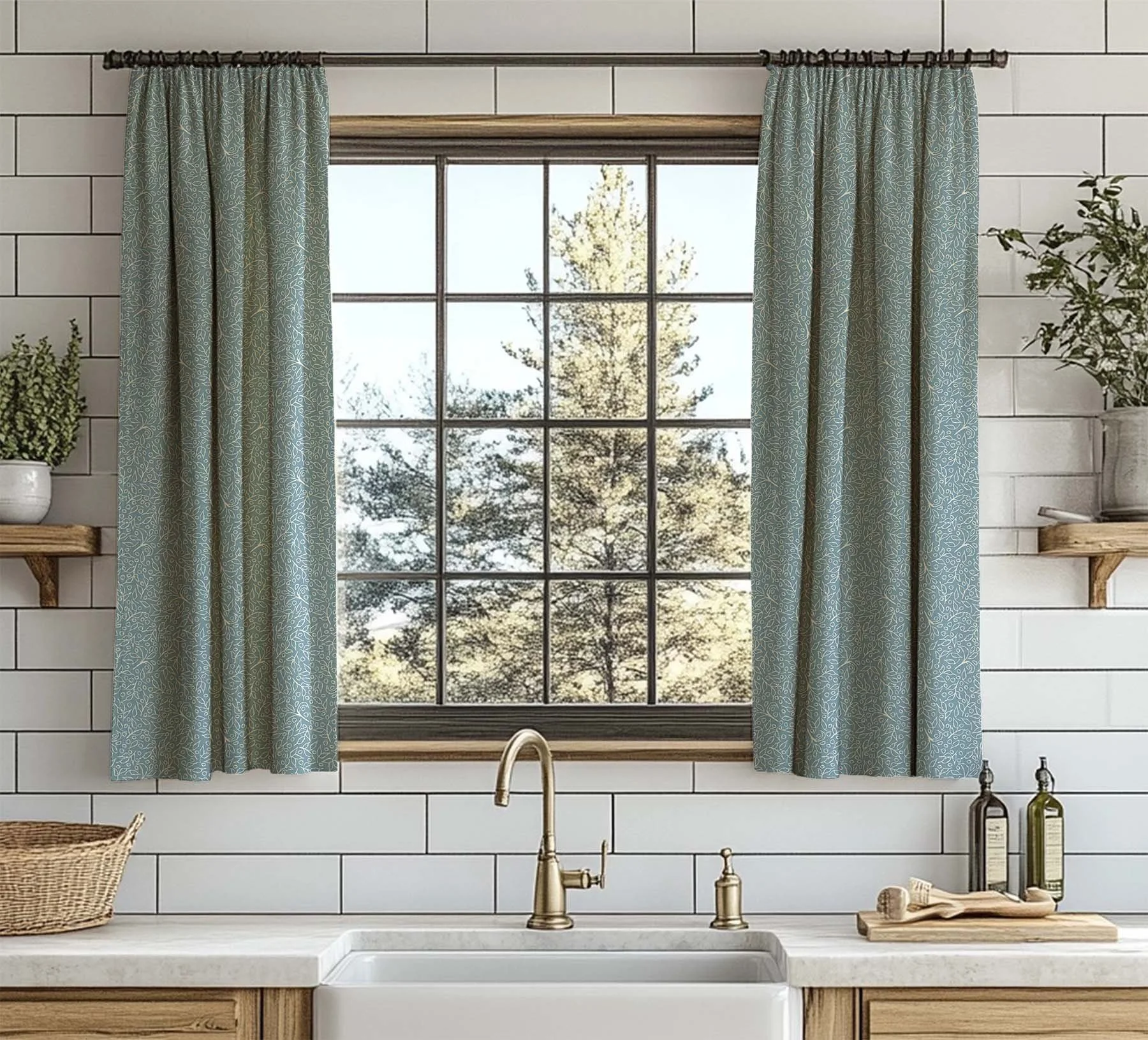 Dusty blue Grove Vine Botanical Toss fabric shown as curtains in a warm wood and white tile kitchen.