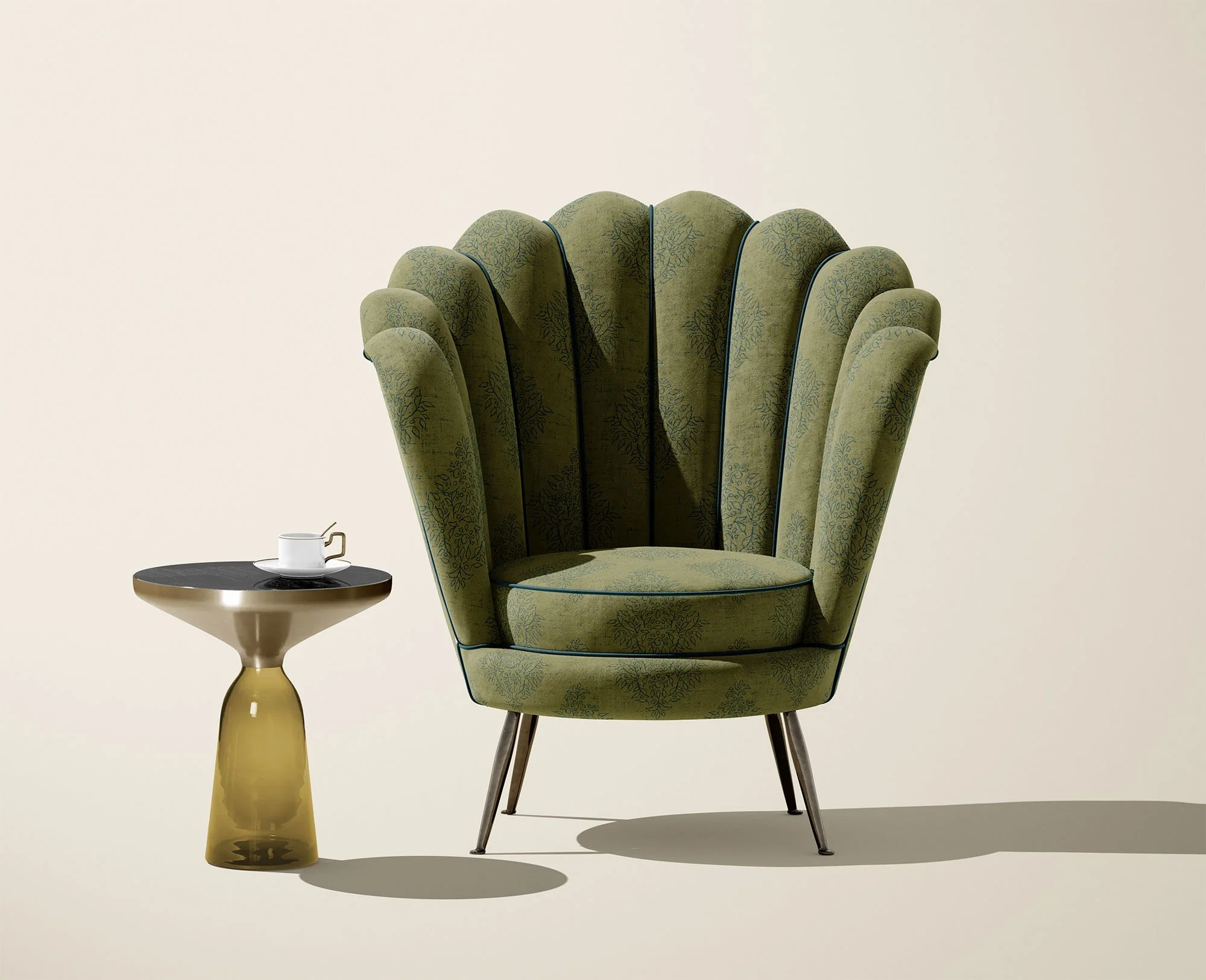 Olive green and dusty teal Folk Damask fabric from the Grove Vine collection shown on a scalloped upholstered accent chair.