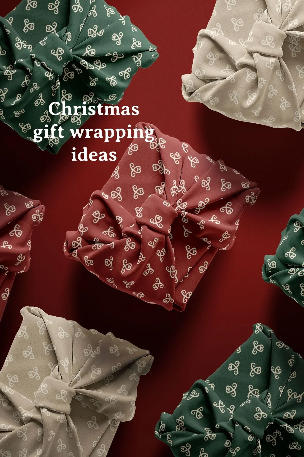 Christmas gifts wrapped and knotted in coordinating Scandi Tulip fabric in red, forest green and warm natural on a deep red background.