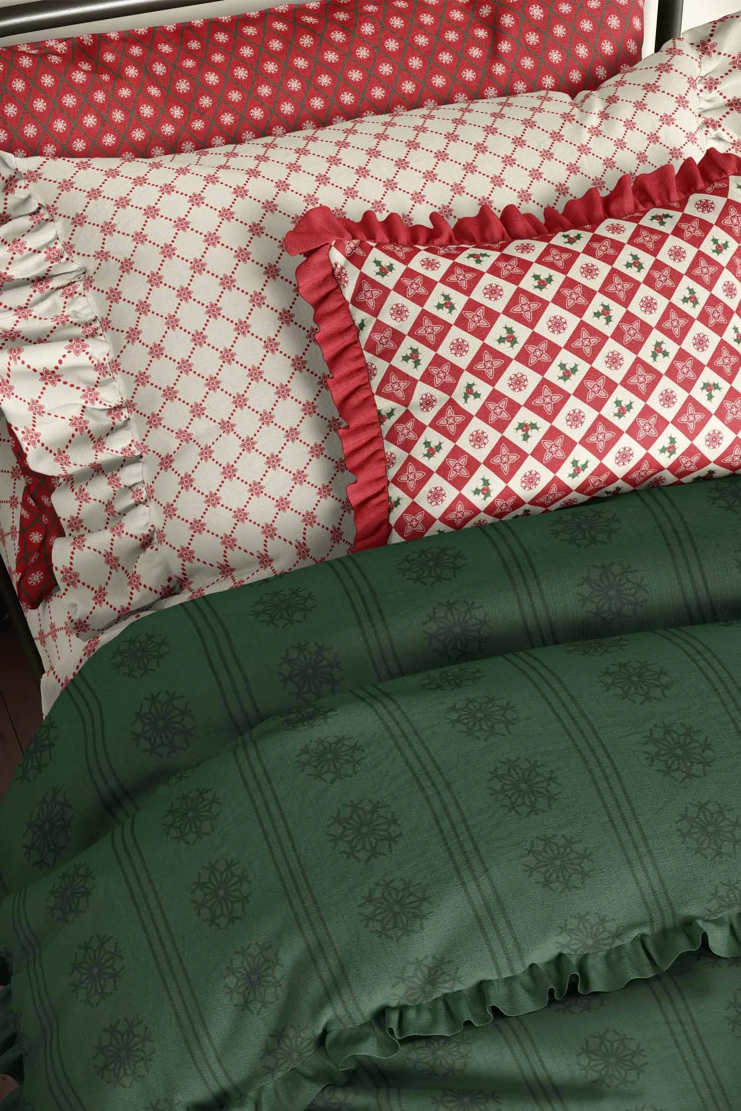 Traditional Christmas bedding layered with red, cream and evergreen patterned pillows and a dark green striped duvet.