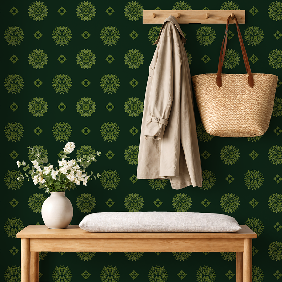 Deep green damask wallpaper from the Heirloom Greenery Heritage Collection styled with a wooden bench, hanging coat, and woven bag.